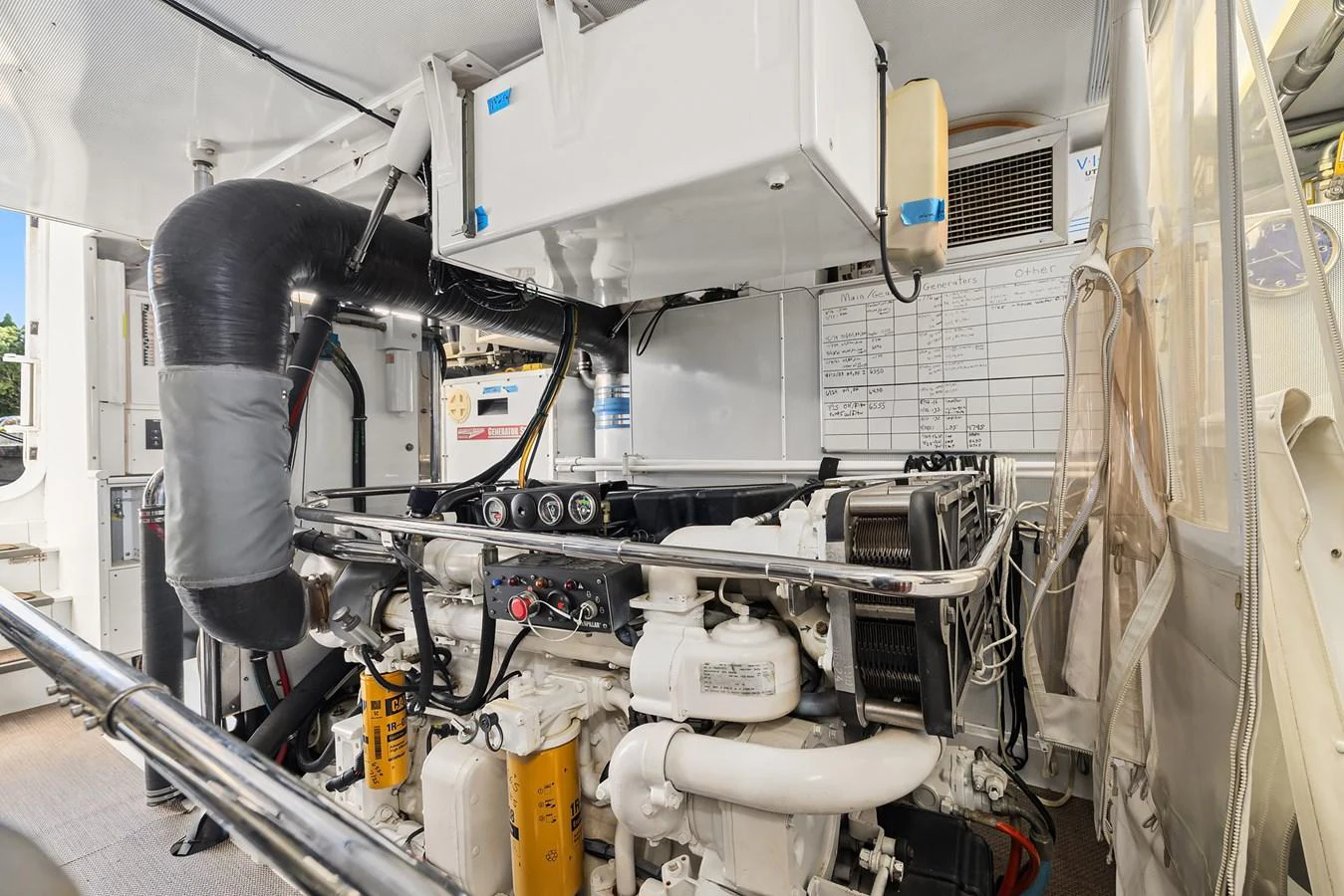 The image showcases the well-maintained engine room of the yacht, highlighting its mechanical components. aboard MI AMERE Yacht for Sale