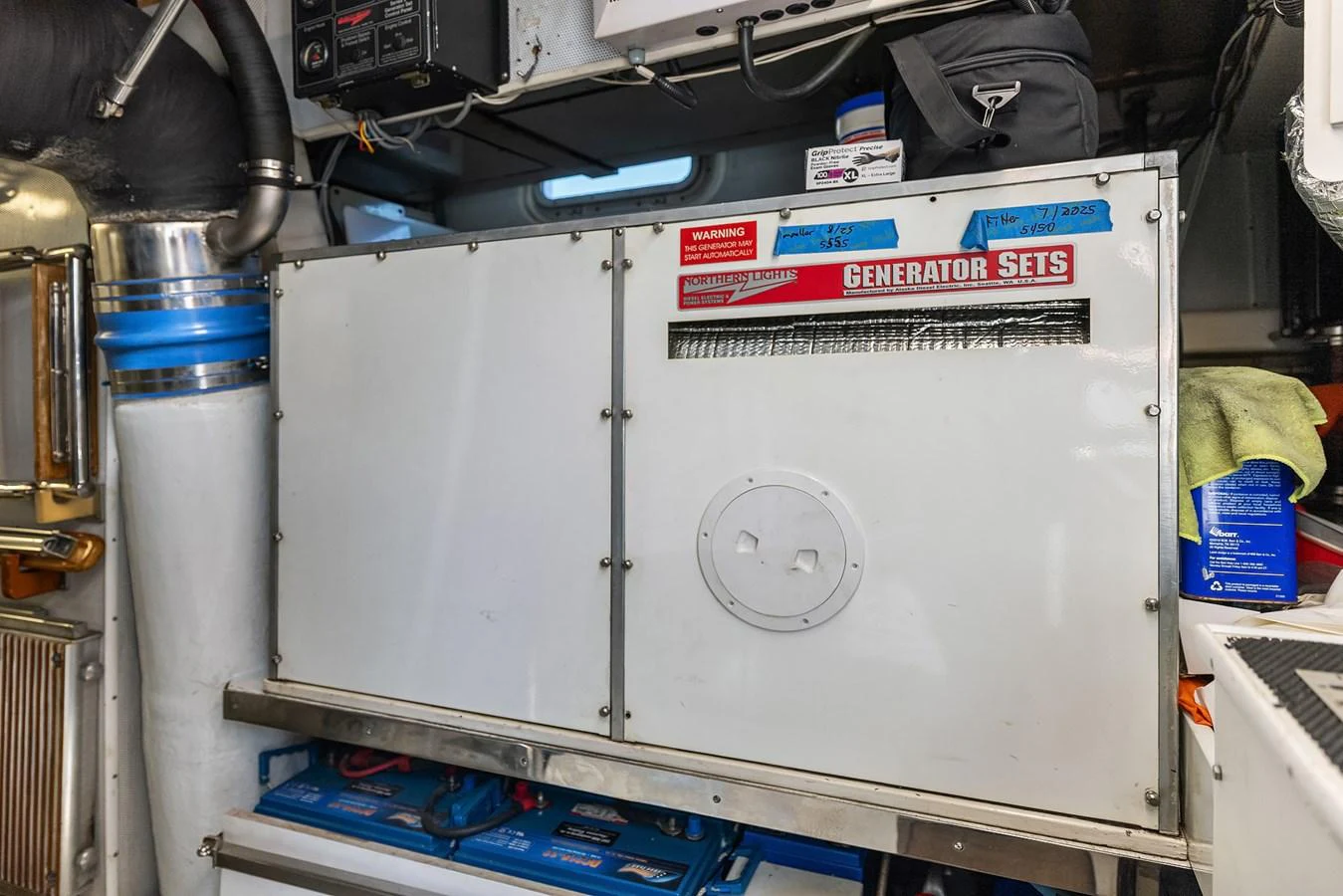 The image showcases the generator sets within the yacht's engine room, highlighting the technical equipment and maintenance area. aboard MI AMERE Yacht for Sale