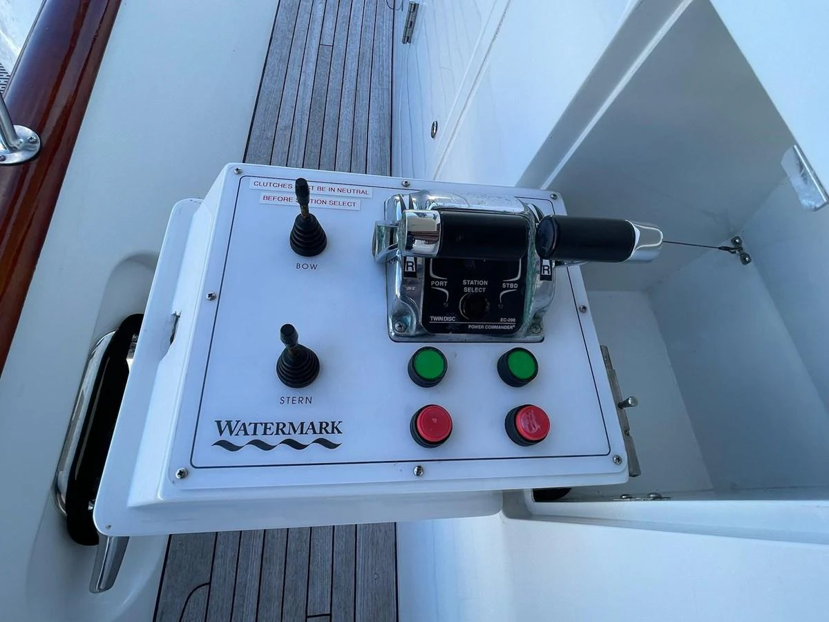 A close-up view of the yacht's control panel with various buttons and switches. aboard MI AMERE Yacht for Sale