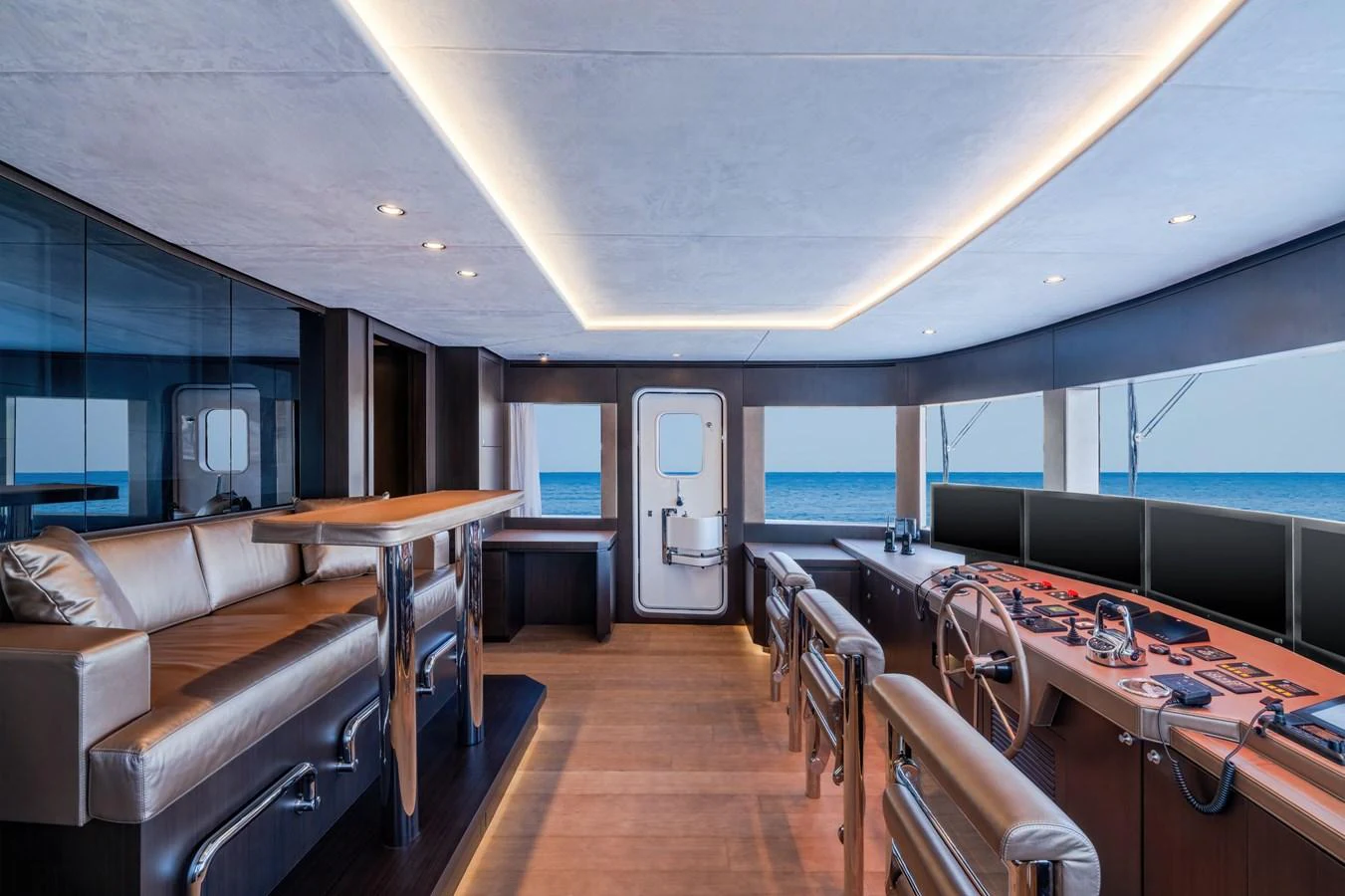 The helm area features sleek design with modern controls and a panoramic view of the sea. aboard E SERIES 125 HARGRAVE SUPERYACHTS Yacht for Sale