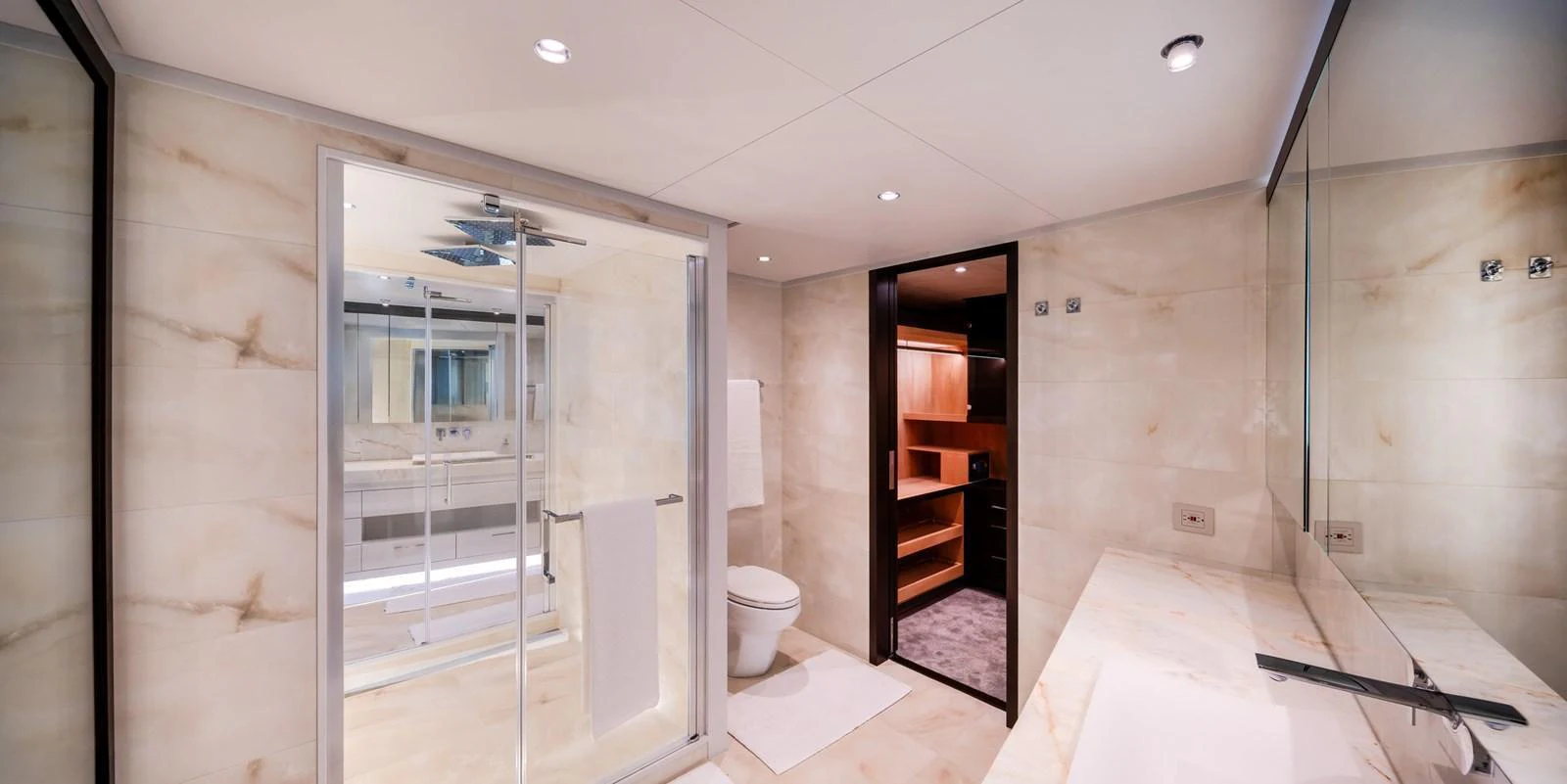 The yacht's bathroom features a spacious and modern design with luxurious fixtures. aboard E SERIES 125 HARGRAVE SUPERYACHTS Yacht for Sale