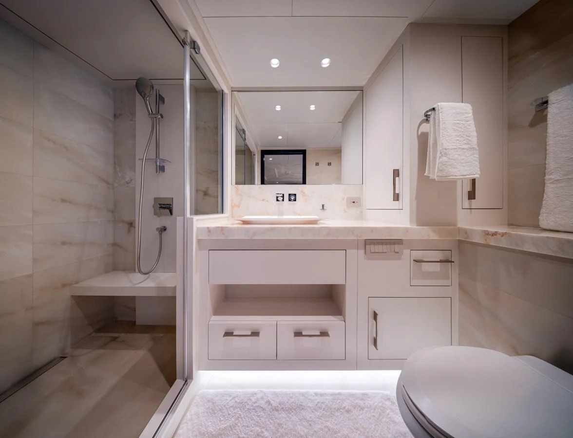 The yacht's bathroom features a modern design with elegant fixtures and ample lighting. aboard E SERIES 125 HARGRAVE SUPERYACHTS Yacht for Sale