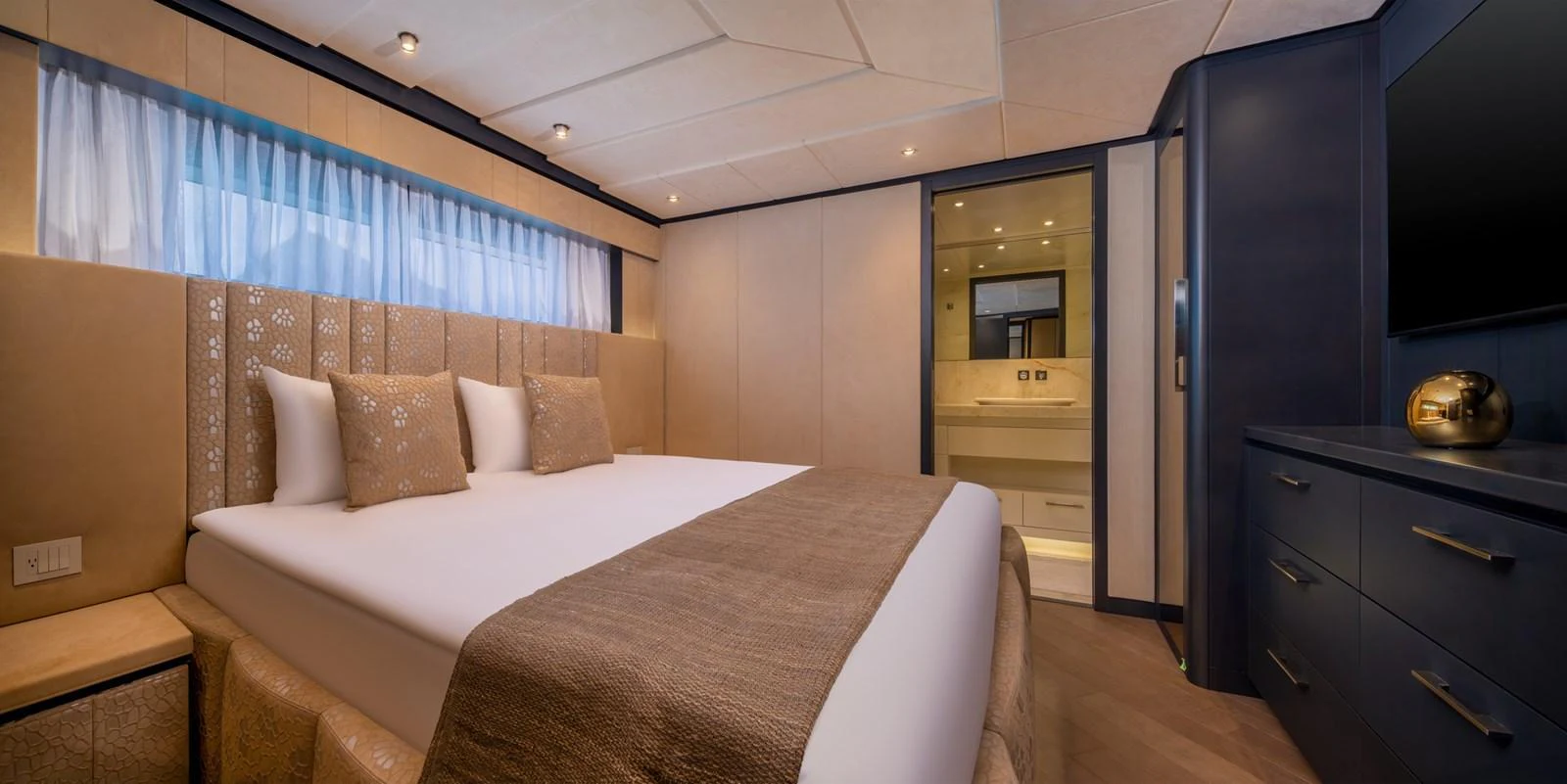 A luxurious stateroom featuring a large bed, elegant decor, and an ensuite bathroom. aboard E SERIES 125 HARGRAVE SUPERYACHTS Yacht for Sale