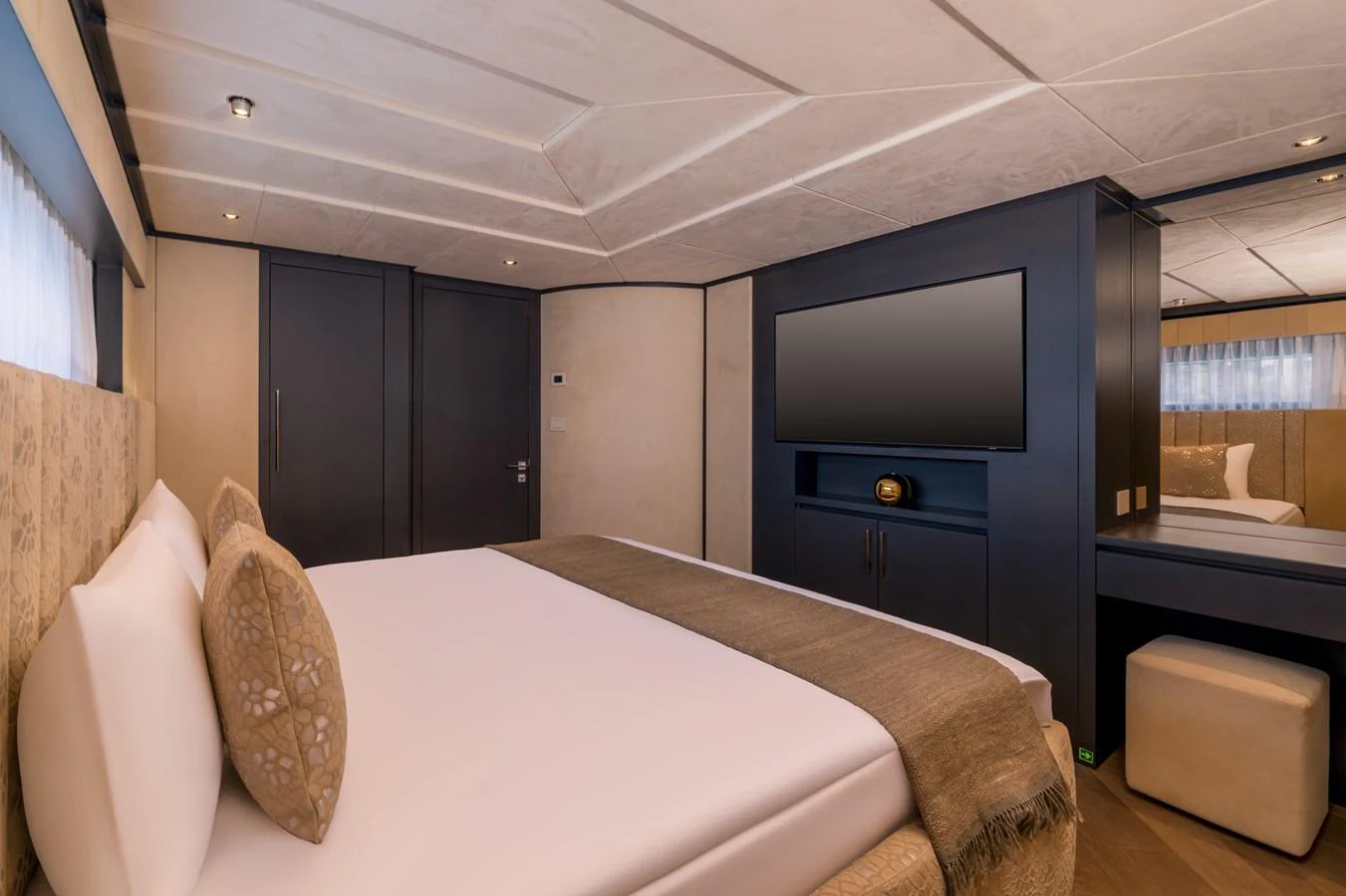 The master stateroom features a luxurious bed with elegant decor and modern amenities. aboard E SERIES 125 HARGRAVE SUPERYACHTS Yacht for Sale