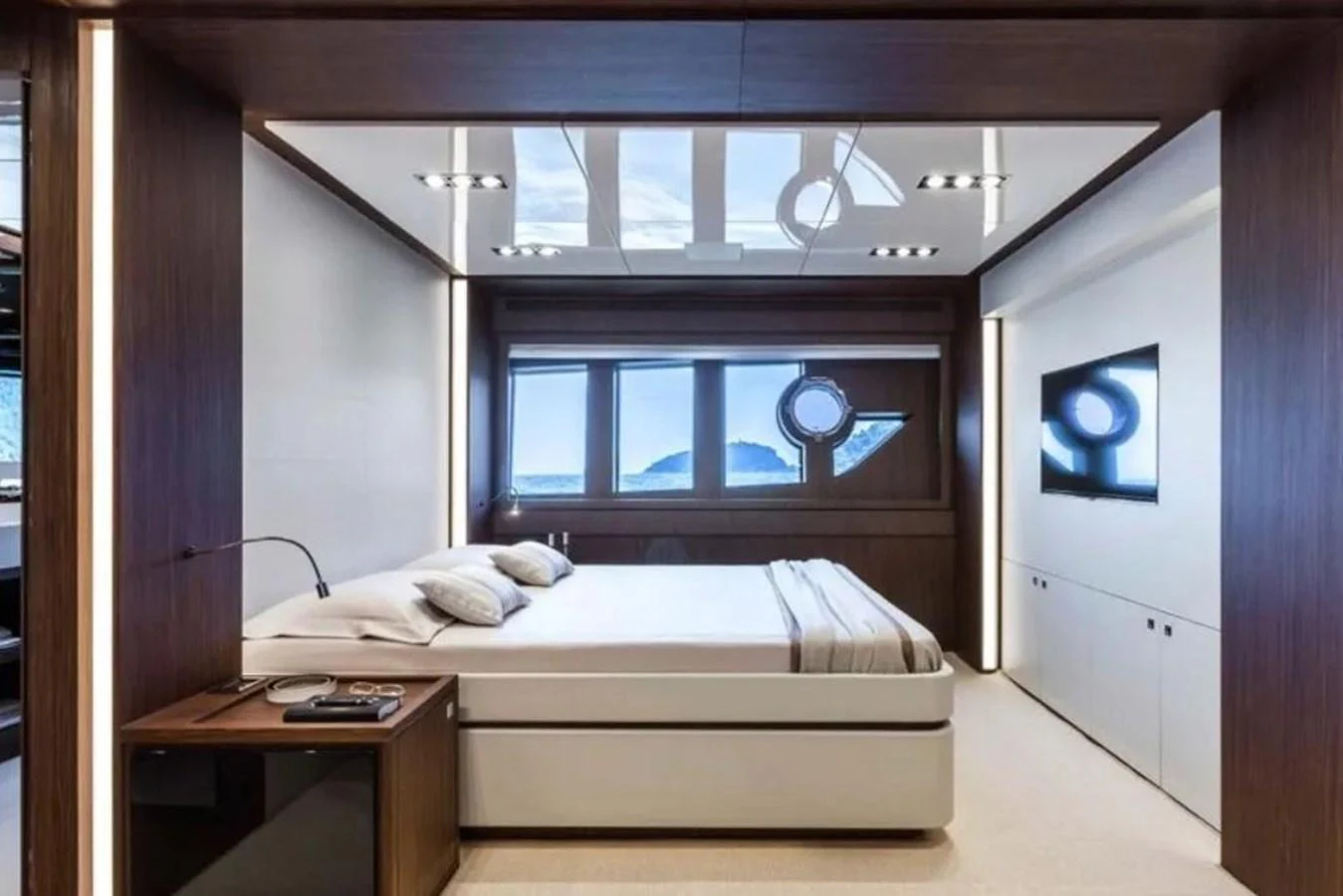 This luxurious stateroom features a modern design with ample natural light and elegant furnishings. aboard ANTIOXIDANT Yacht for Sale