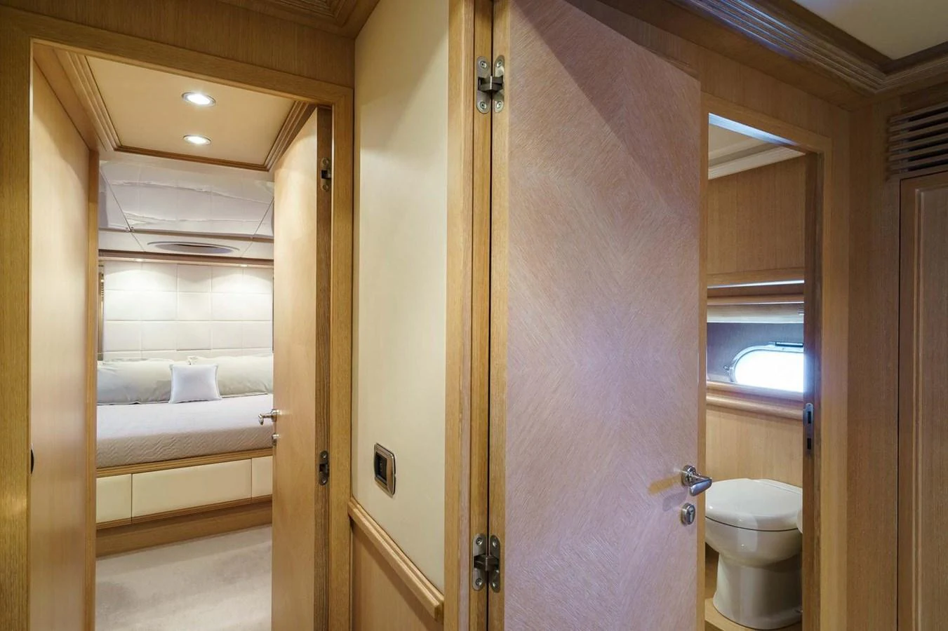 a bathroom with a toilet and a bathtub aboard ALLIE Yacht for Sale
