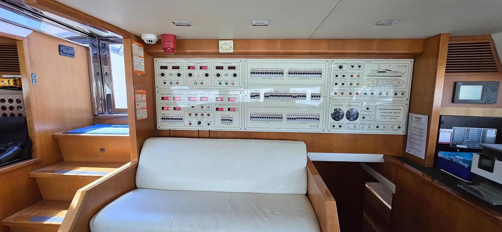 The control room features a comfortable seating area and an array of sophisticated control panels. aboard BALKAN Yacht for Sale