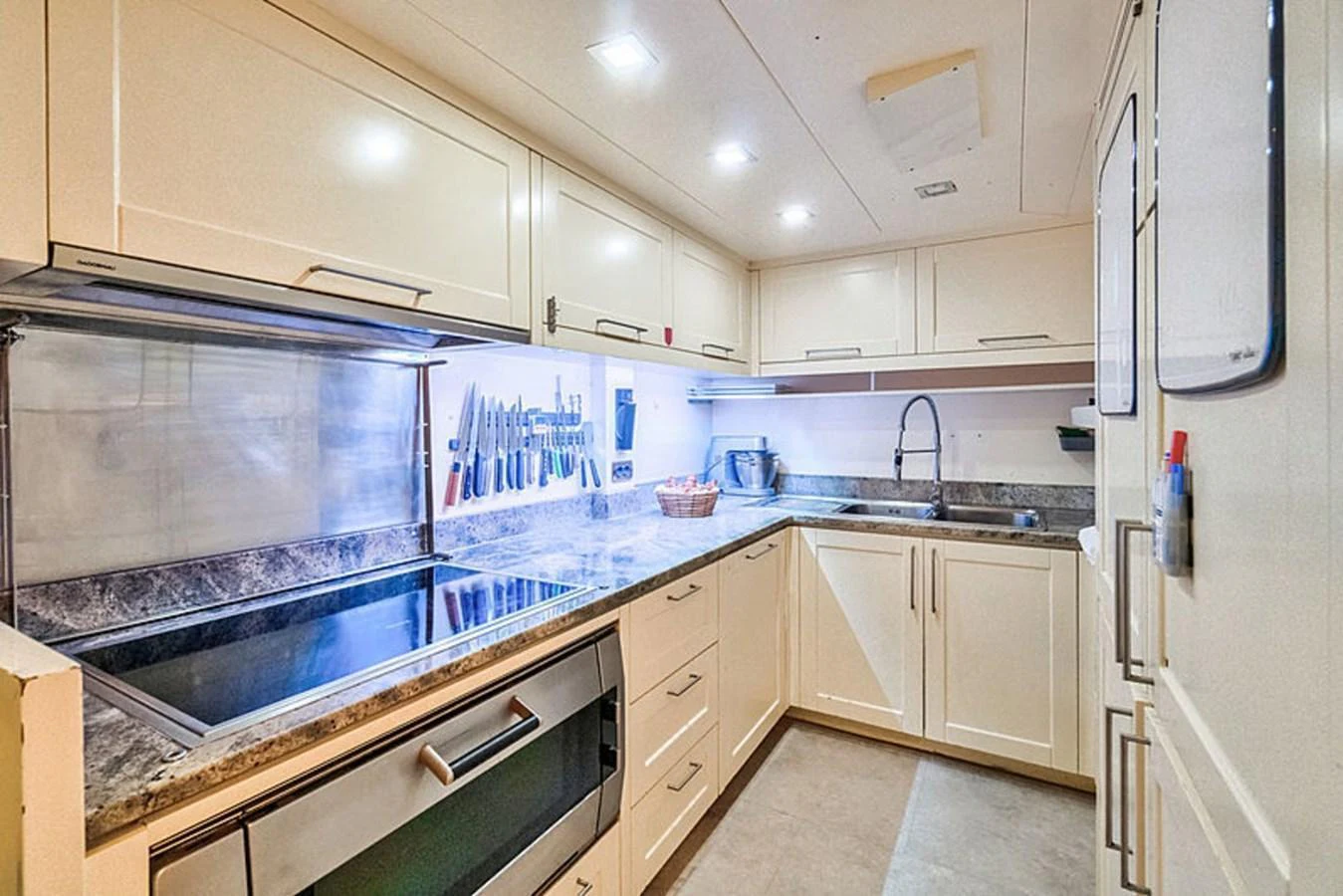 The yacht's galley is equipped with modern appliances and ample counter space for meal preparation. aboard BALKAN Yacht for Sale