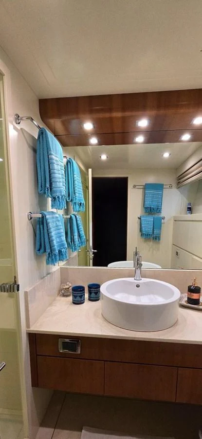 The yacht's bathroom features modern fixtures and a clean, elegant design. aboard BALKAN Yacht for Sale