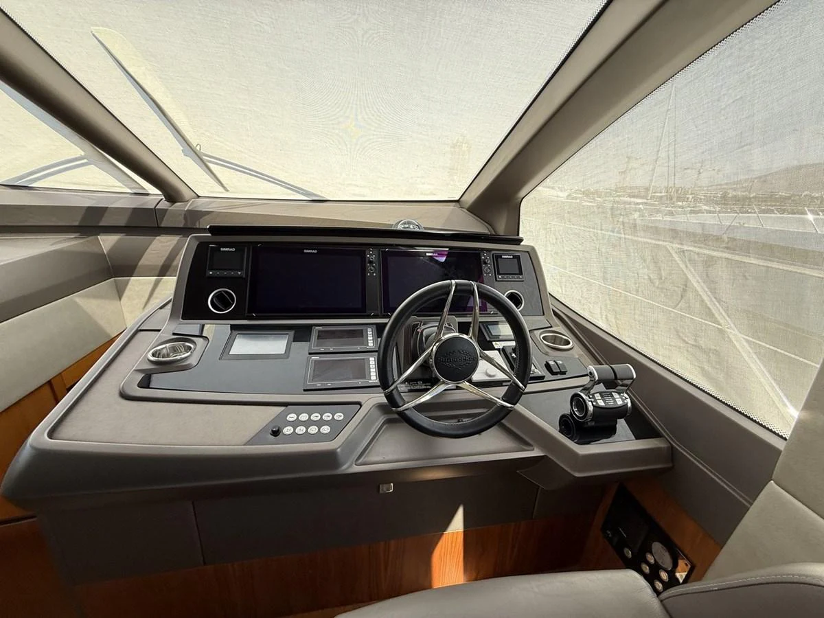The helm station features advanced navigation equipment and a sleek, modern design. aboard "BISHWISH" Yacht for Sale