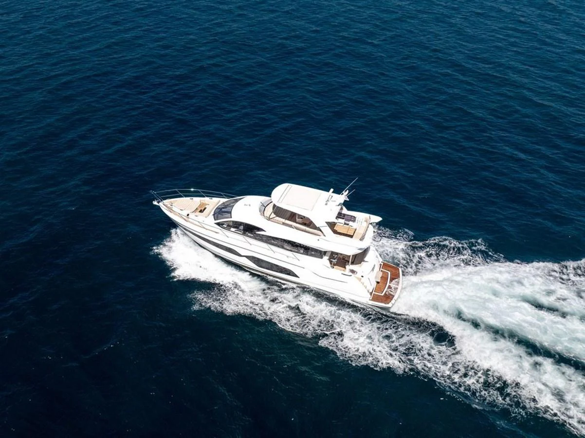 A sleek yacht cruises through the open water, showcasing its elegant design and powerful performance. aboard "BISHWISH" Yacht for Sale