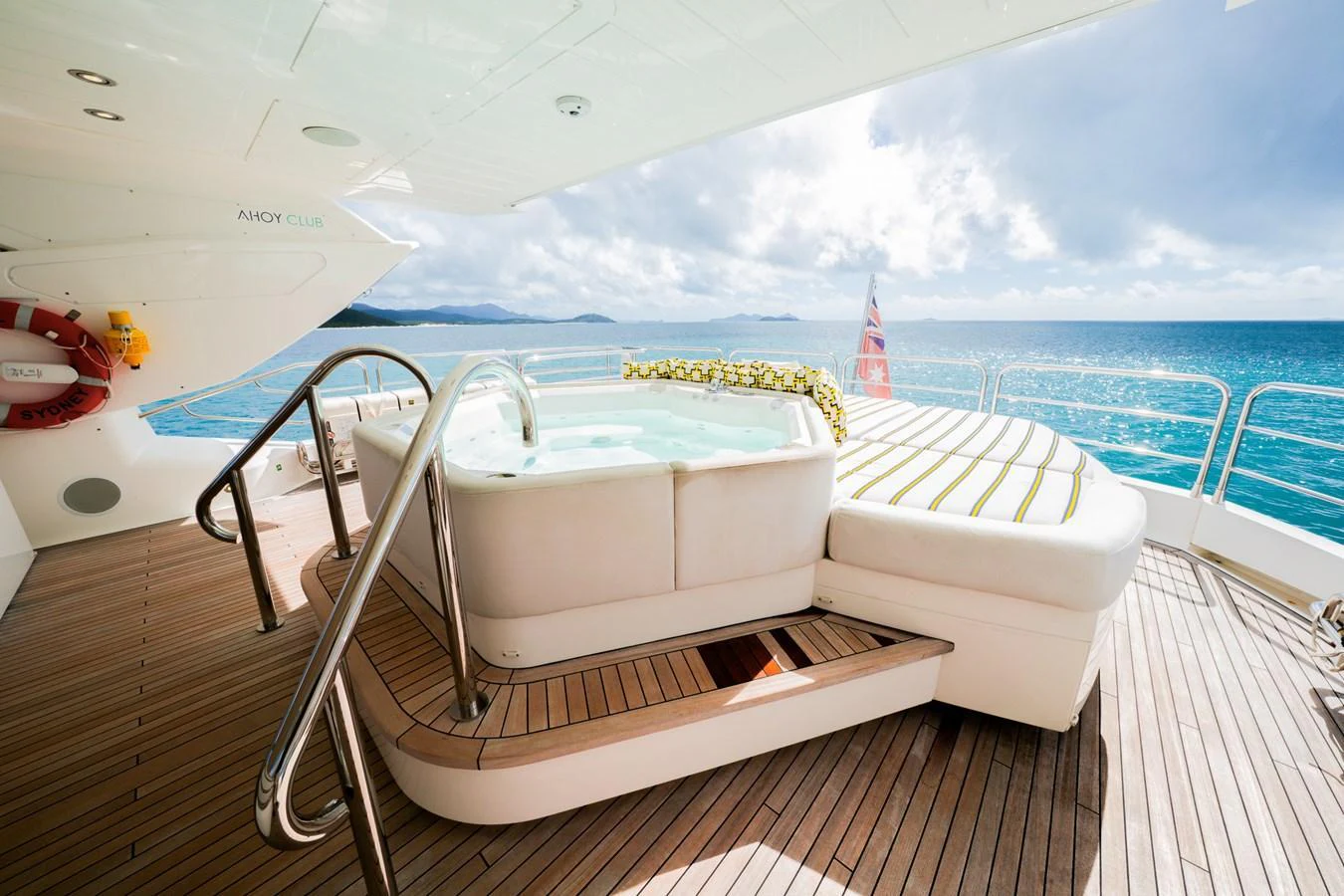 The sundeck features a luxurious jacuzzi with stunning ocean views. aboard RASCAL Yacht for Sale