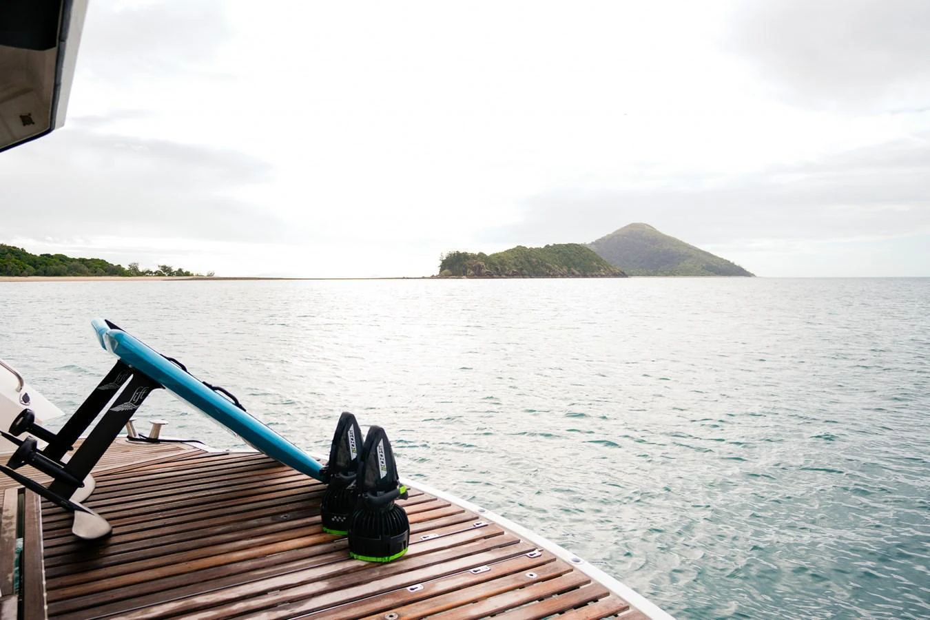 The swim platform offers easy access to the water, complete with a paddleboard and flippers for aquatic adventures. aboard RASCAL Yacht for Sale