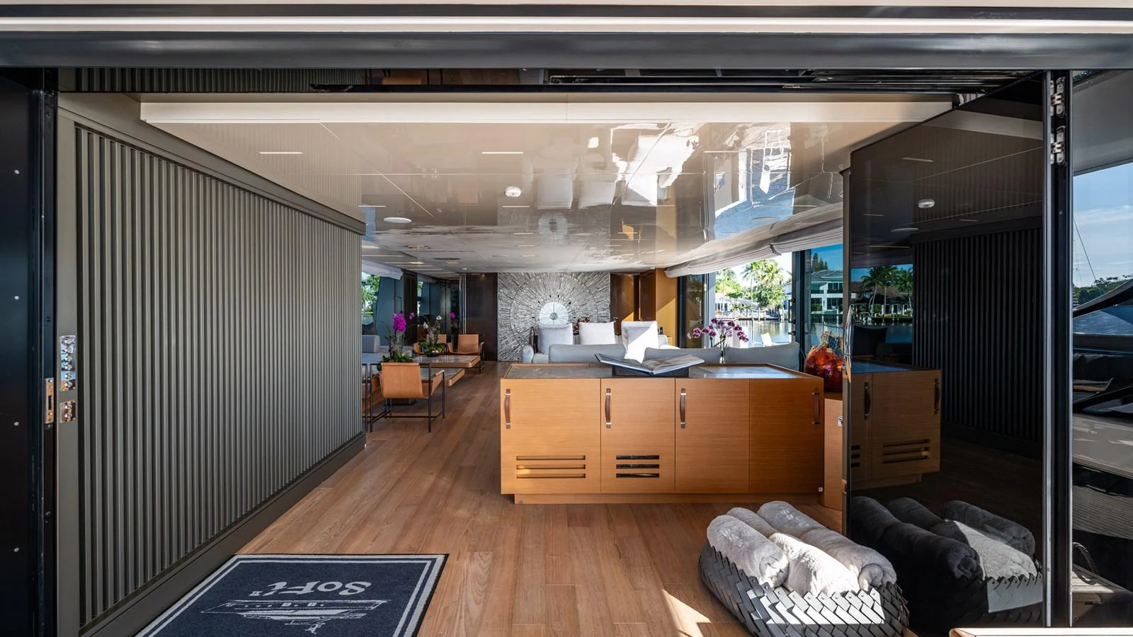 a room with a couch and a table aboard SANLORENZO SL120/778 Yacht for Sale