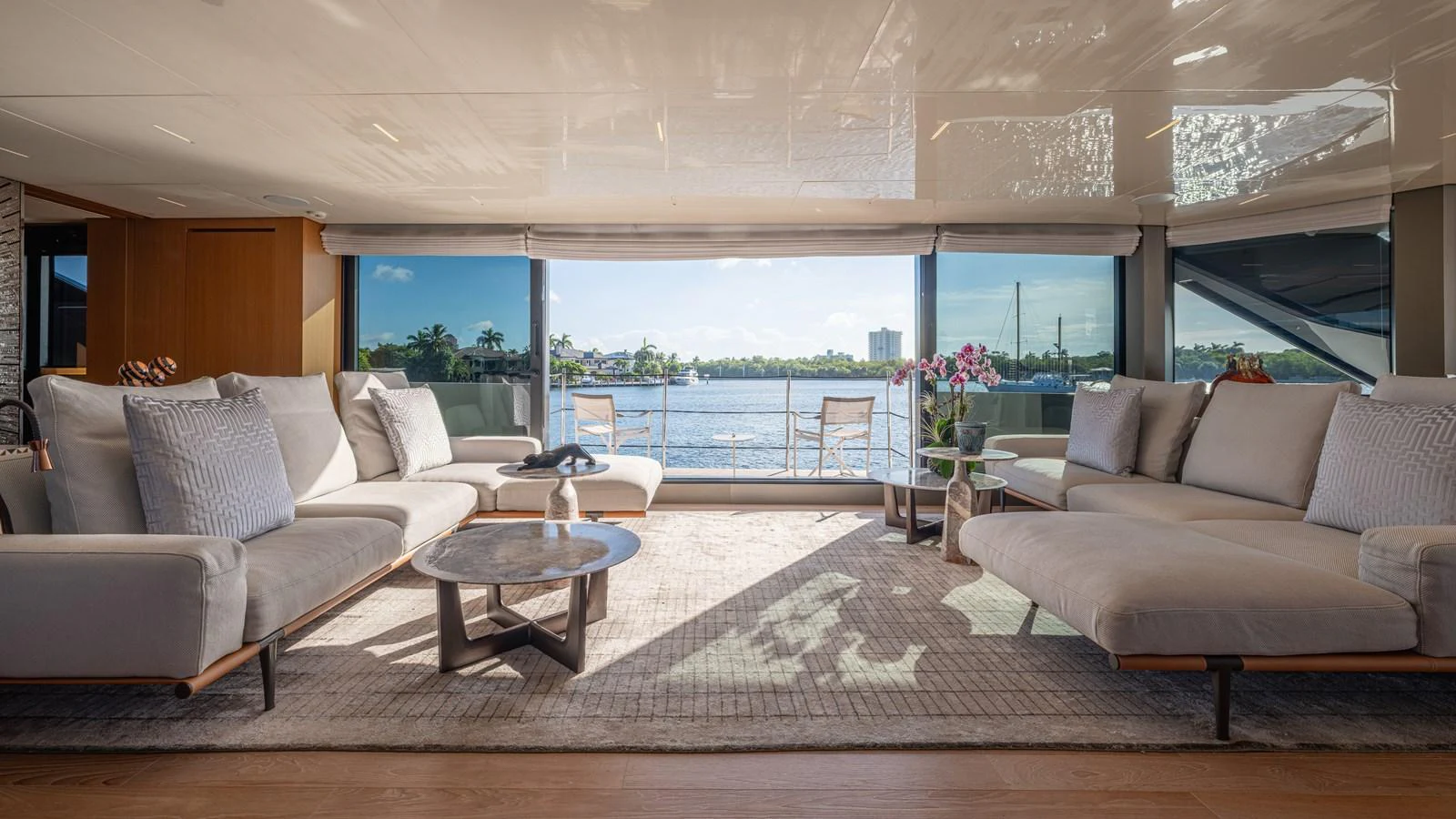 a living room with a large window aboard SANLORENZO SL120/778 Yacht for Sale