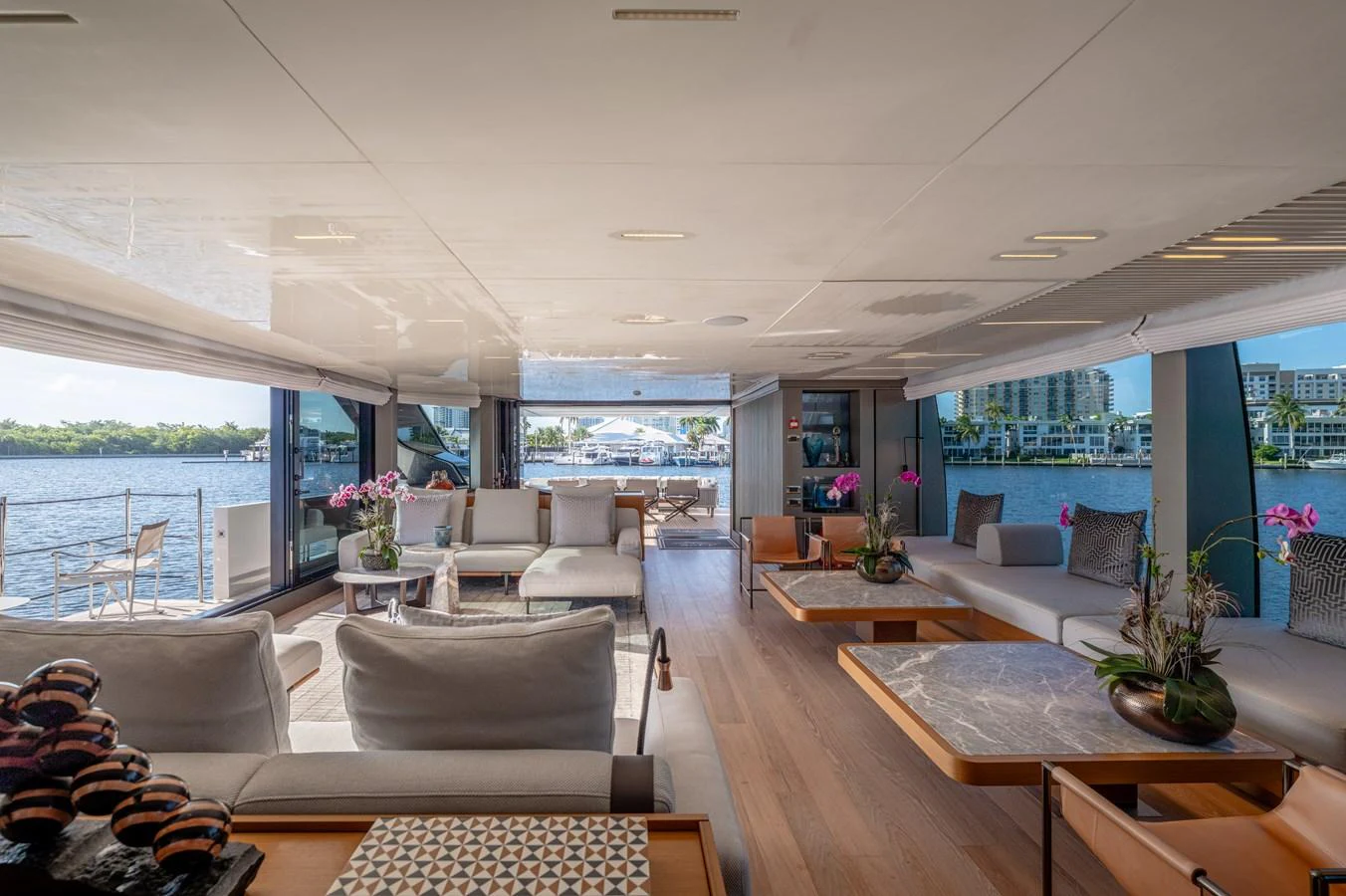 a living room with a large window aboard SANLORENZO SL120/778 Yacht for Sale