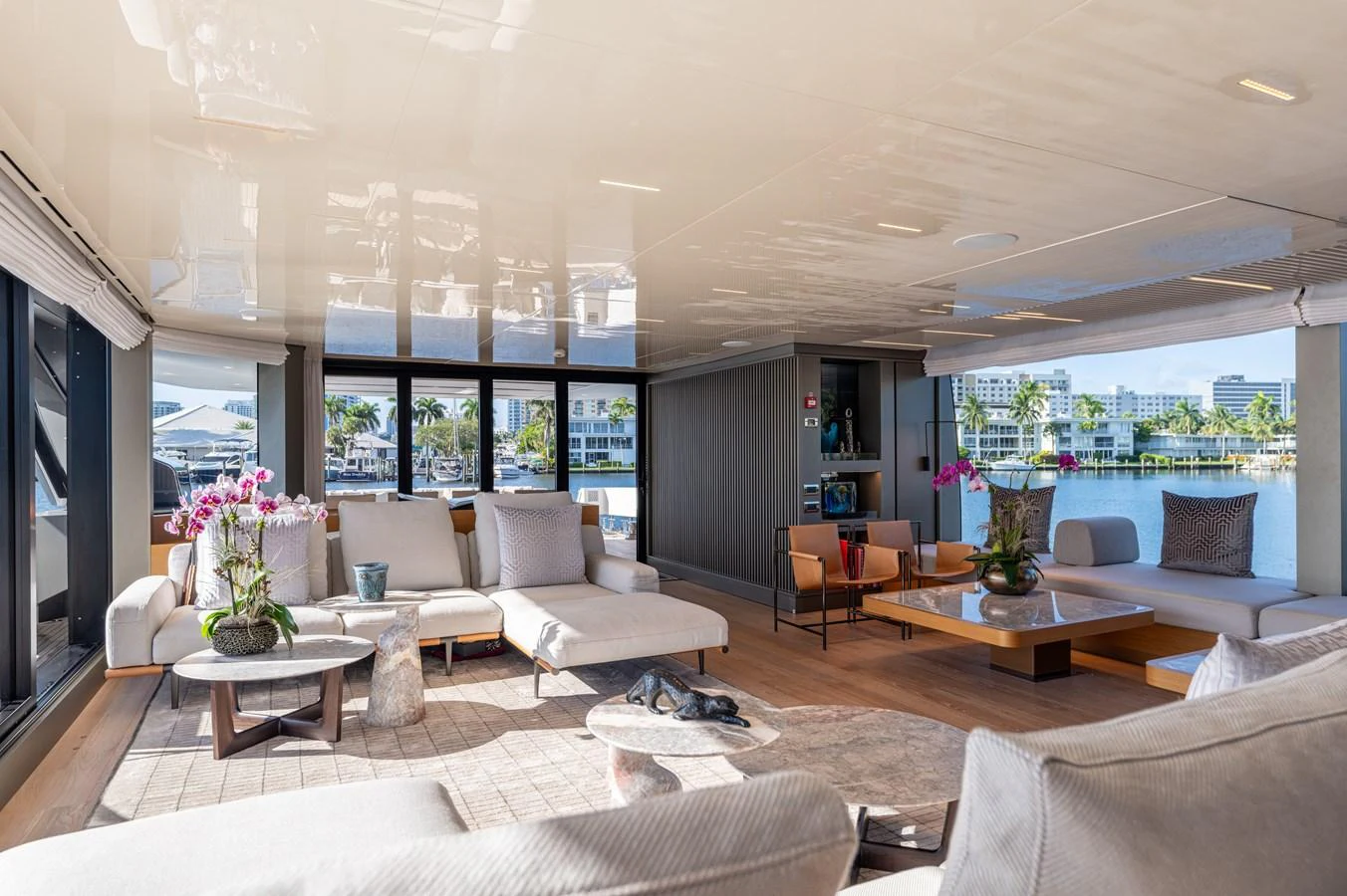 a living room with a large window aboard SANLORENZO SL120/778 Yacht for Sale
