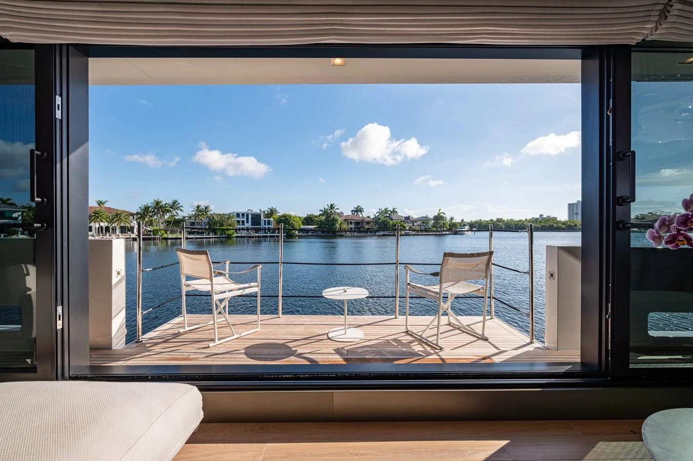 a room with a table and chairs aboard SANLORENZO SL120/778 Yacht for Sale