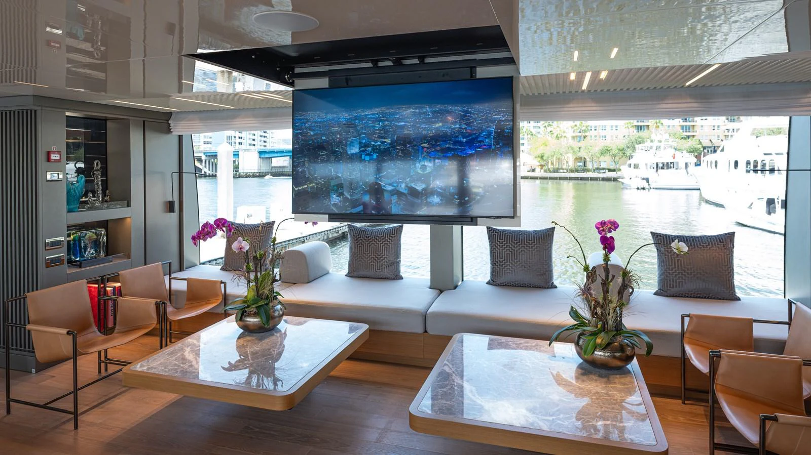 a living room with a large screen aboard SANLORENZO SL120/778 Yacht for Sale