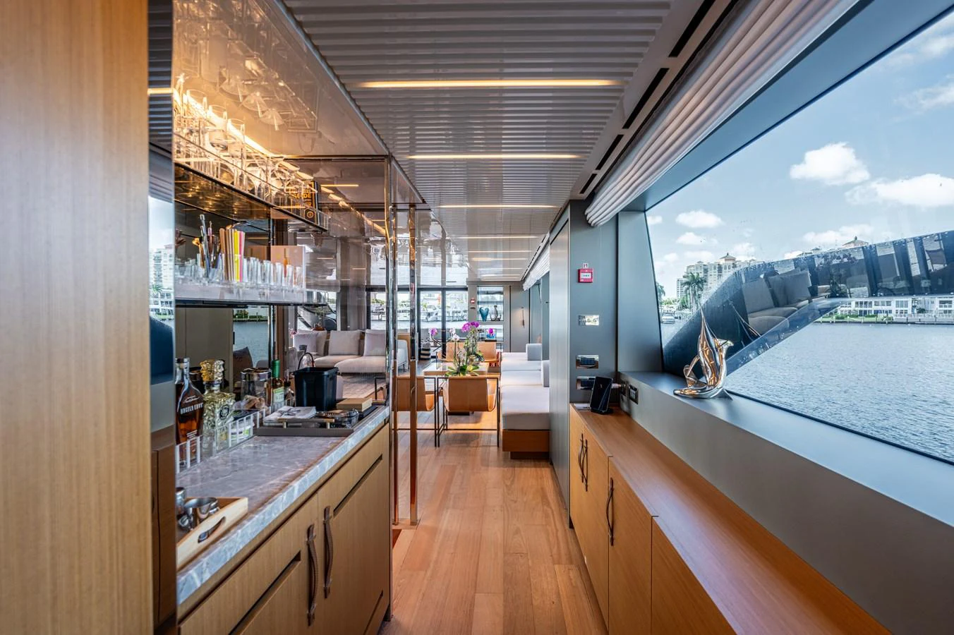 a room with a large window and a pool aboard SANLORENZO SL120/778 Yacht for Sale