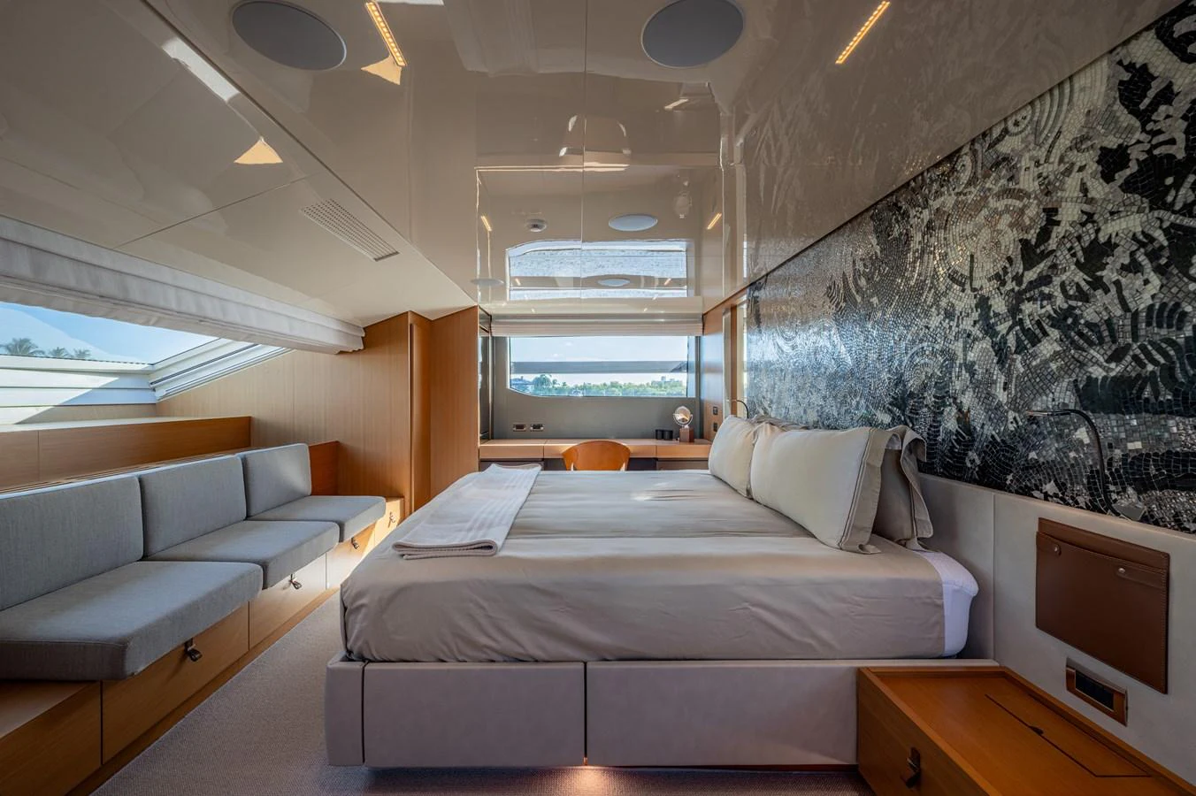 a room with a bed and a couch aboard SANLORENZO SL120/778 Yacht for Sale