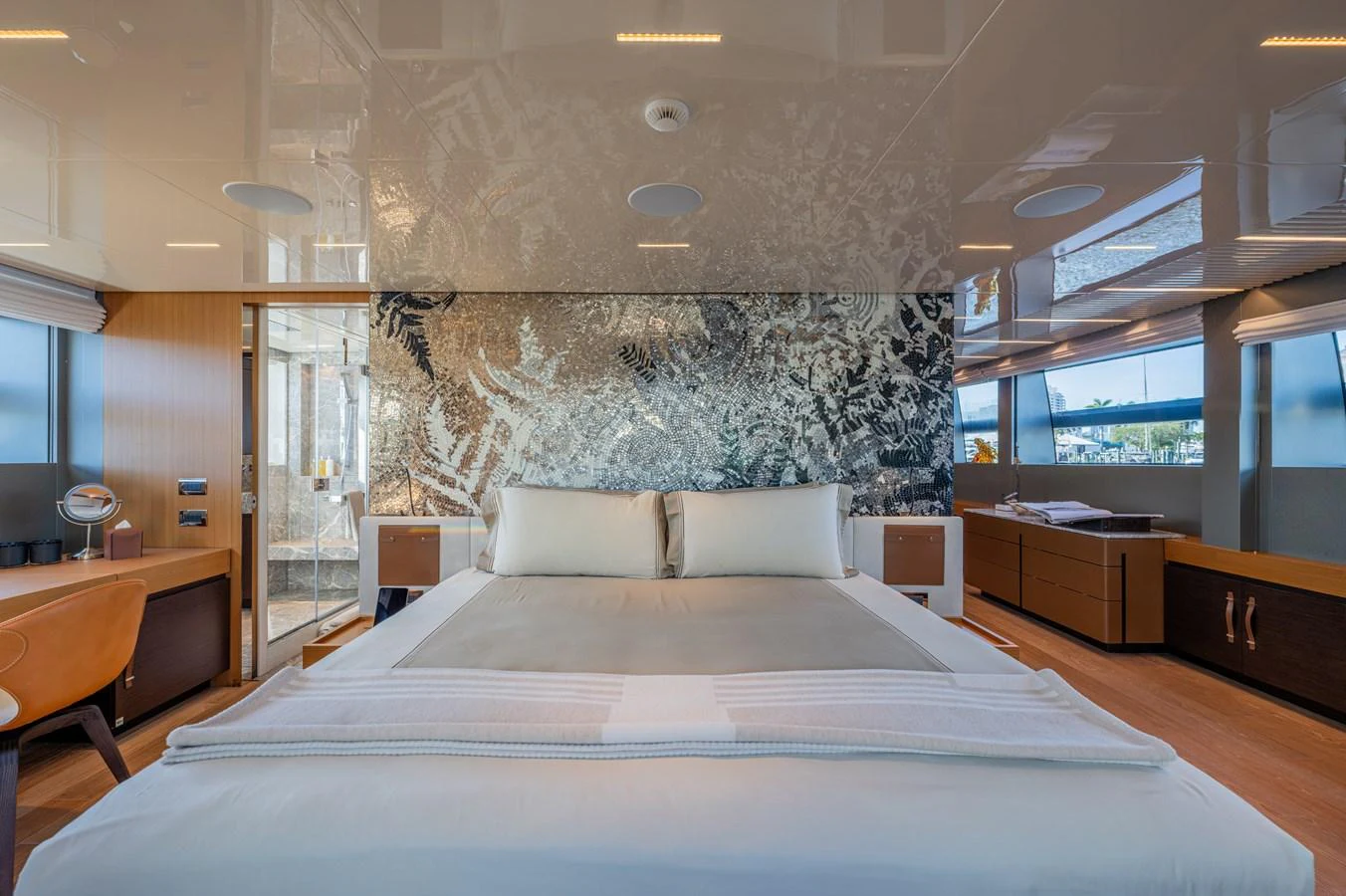 a large bed in a room aboard SANLORENZO SL120/778 Yacht for Sale