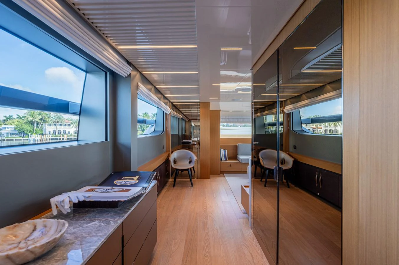 a room with a bed and a table aboard SANLORENZO SL120/778 Yacht for Sale