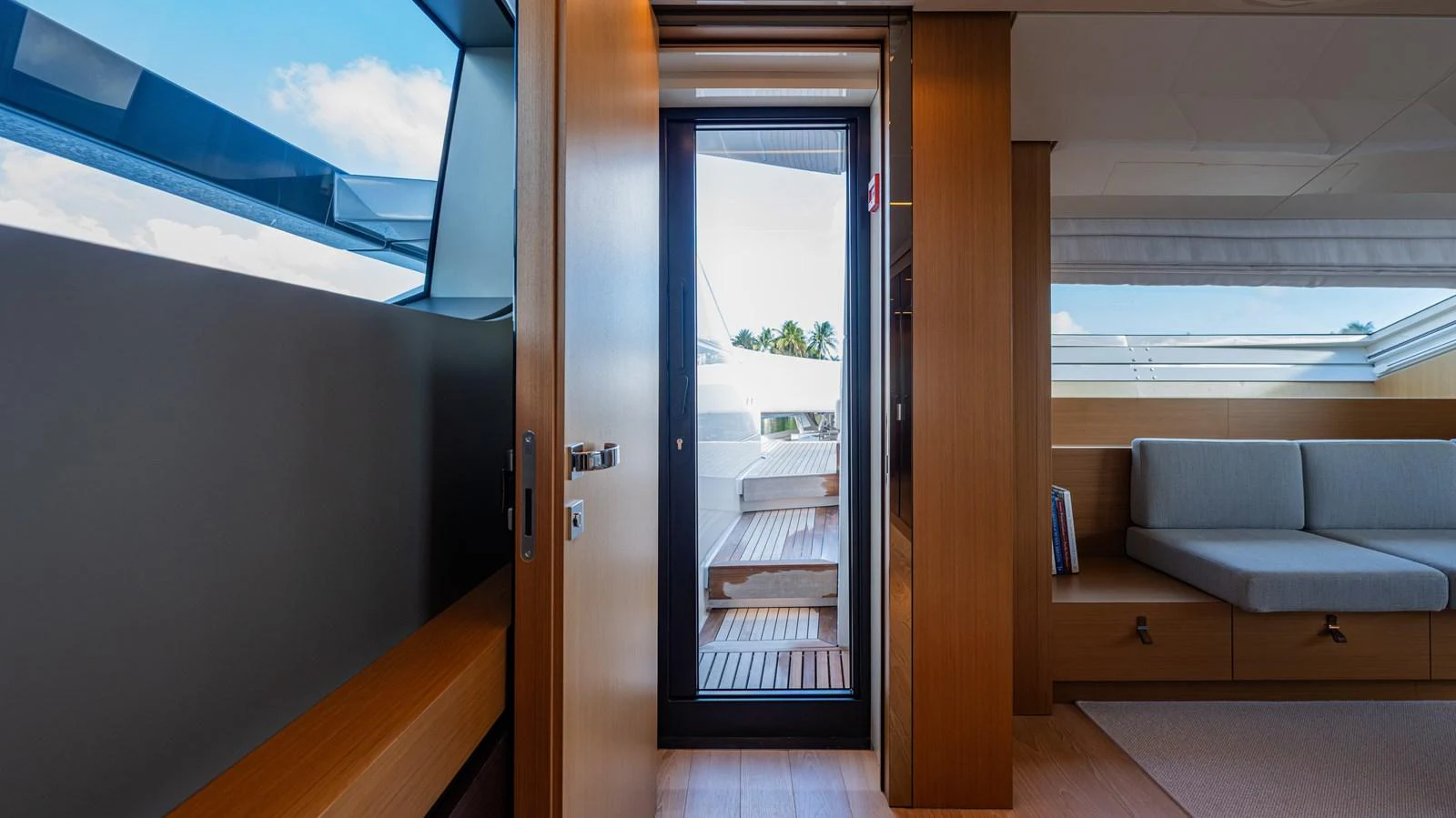 a room with a couch and a door aboard SANLORENZO SL120/778 Yacht for Sale