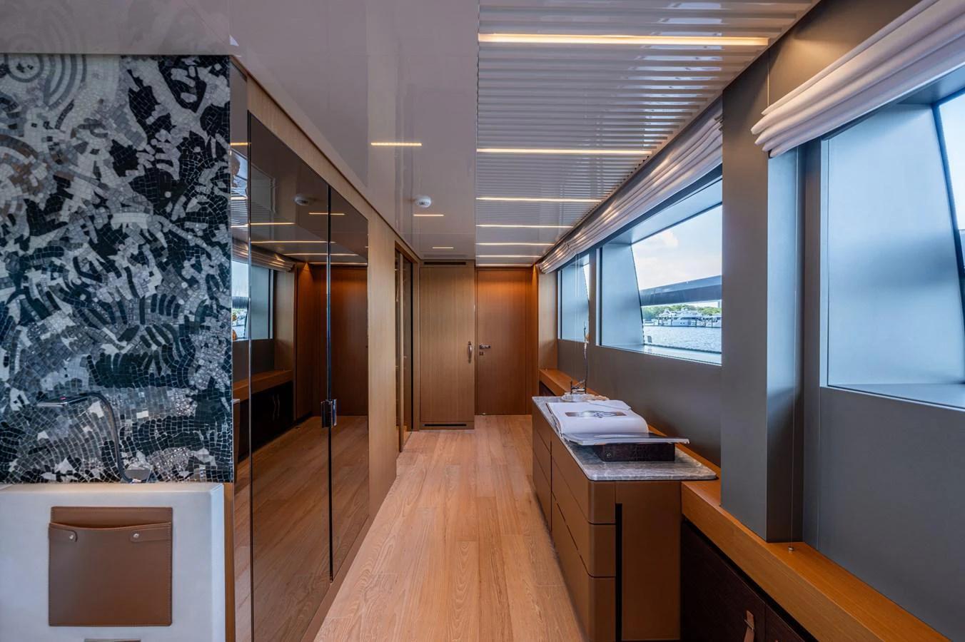 a room with a desk and a window aboard SANLORENZO SL120/778 Yacht for Sale