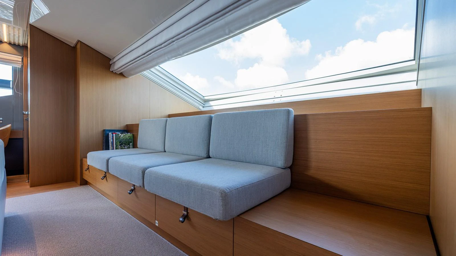 a couch in a room aboard SANLORENZO SL120/778 Yacht for Sale