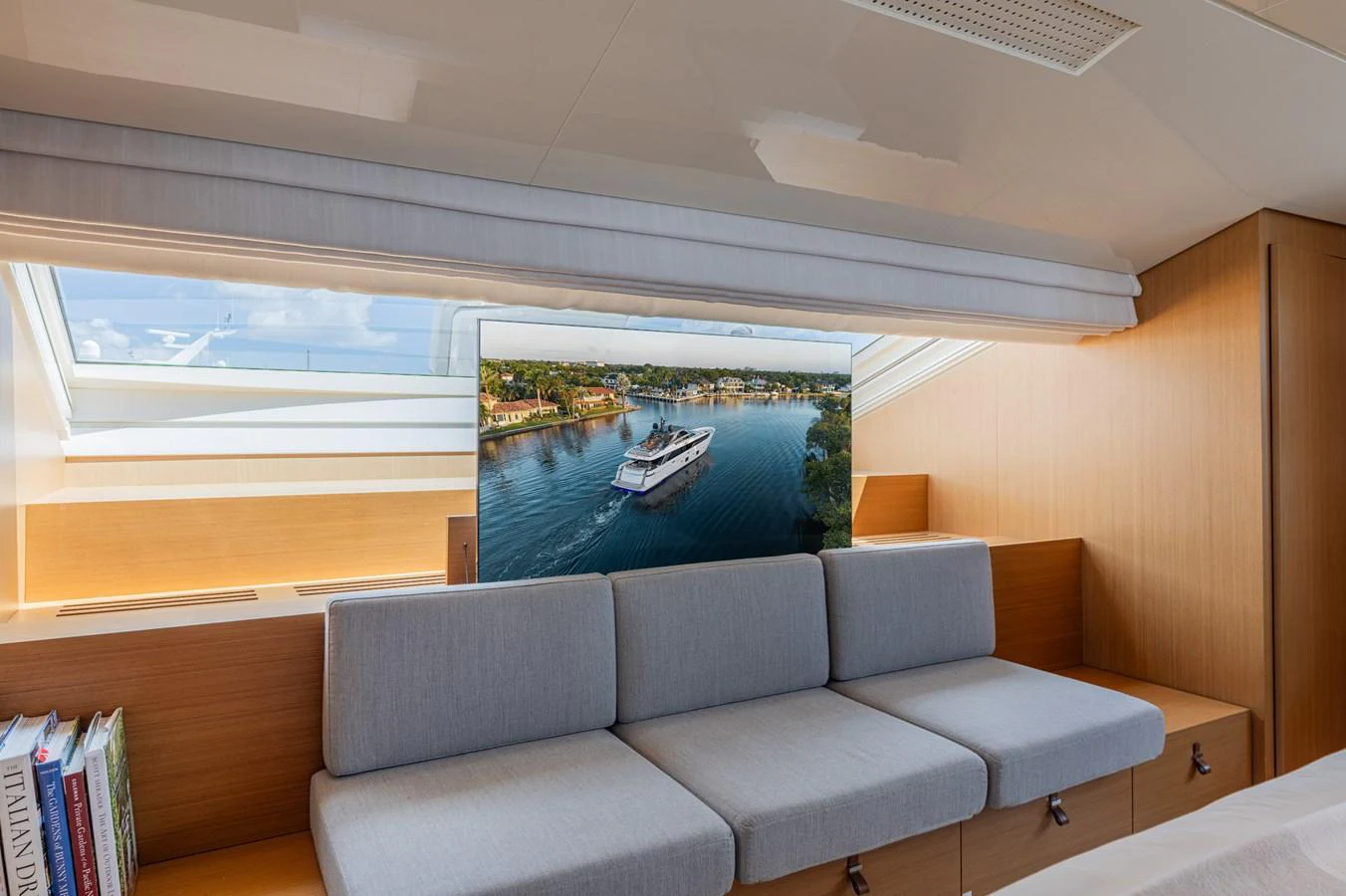 a room with a couch and a pool aboard SANLORENZO SL120/778 Yacht for Sale