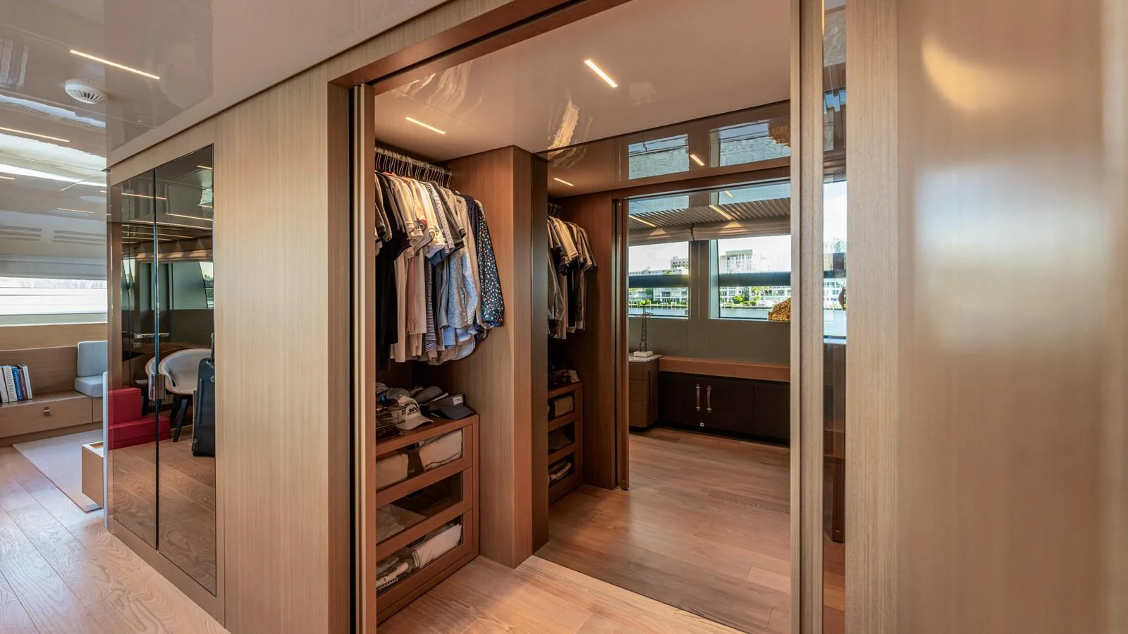 a room with a closet and a bed aboard SANLORENZO SL120/778 Yacht for Sale