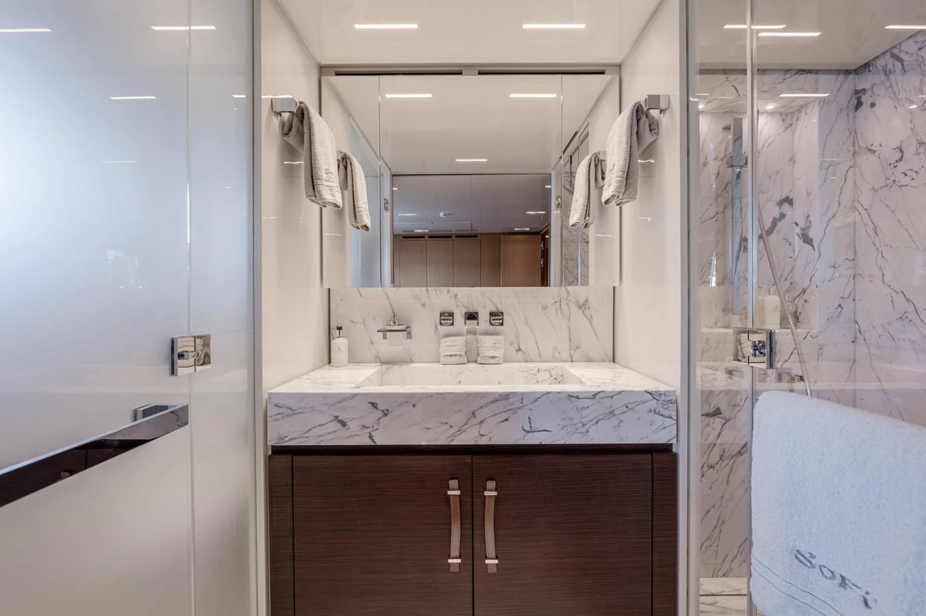 a bathroom with a large mirror aboard SANLORENZO SL120/778 Yacht for Sale