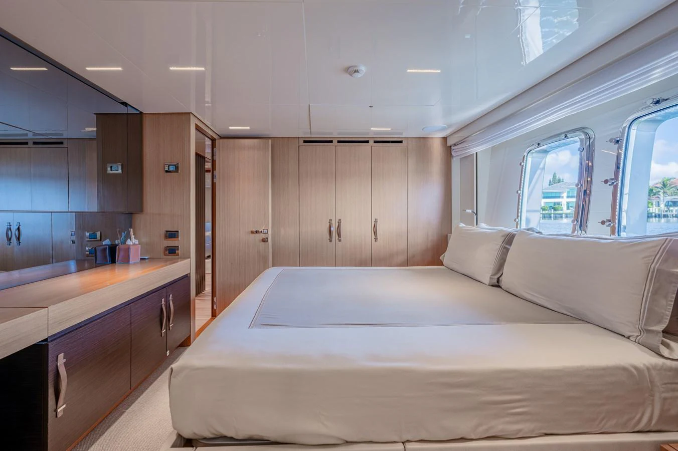 a large bed in a room aboard SANLORENZO SL120/778 Yacht for Sale