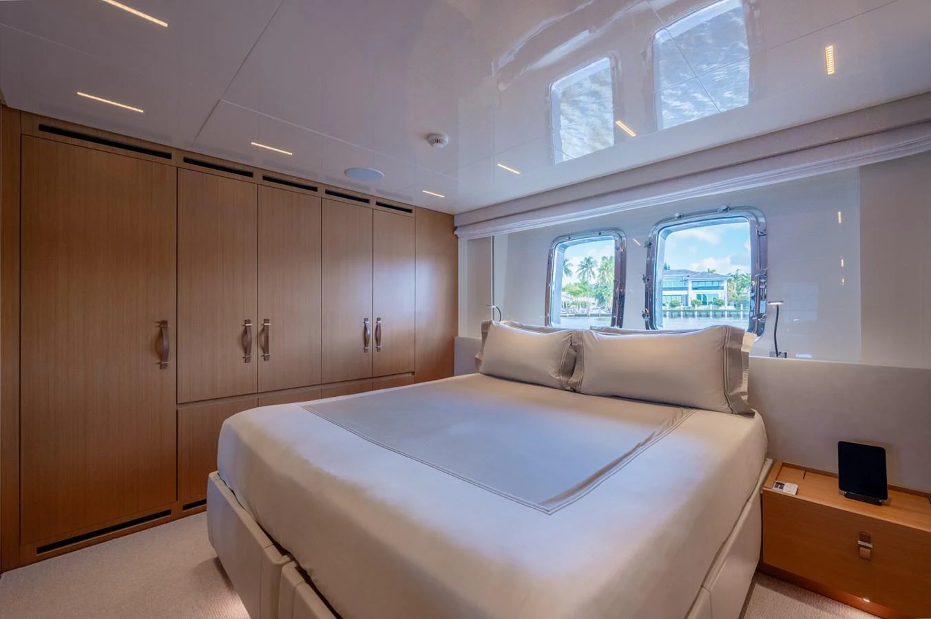 a room with a bed and a desk aboard SANLORENZO SL120/778 Yacht for Sale
