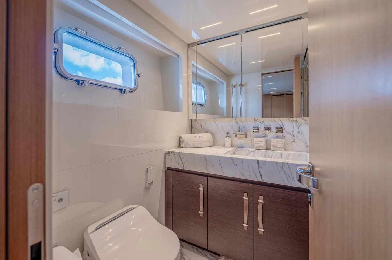 a bathroom with a large mirror aboard SANLORENZO SL120/778 Yacht for Sale