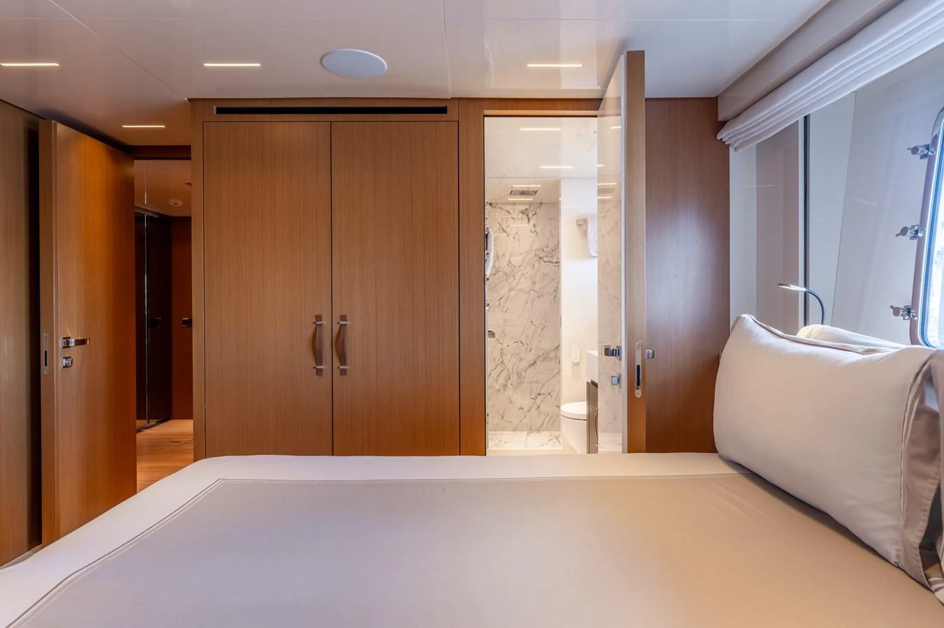 a room with a bed and a door aboard SANLORENZO SL120/778 Yacht for Sale