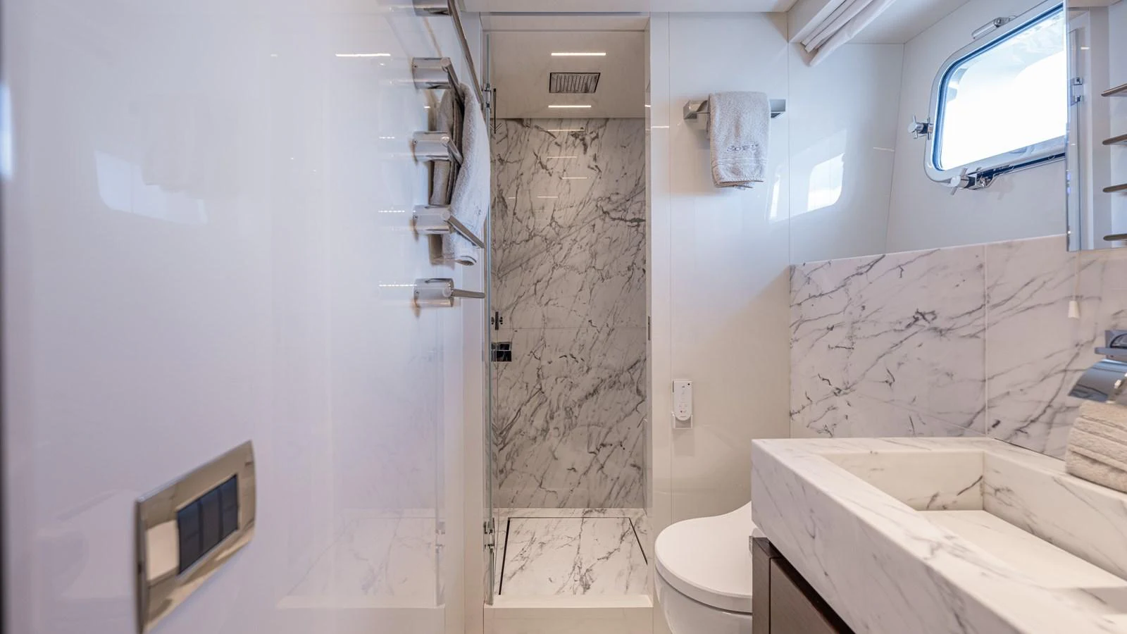 a bathroom with a tub toilet and sink aboard SANLORENZO SL120/778 Yacht for Sale