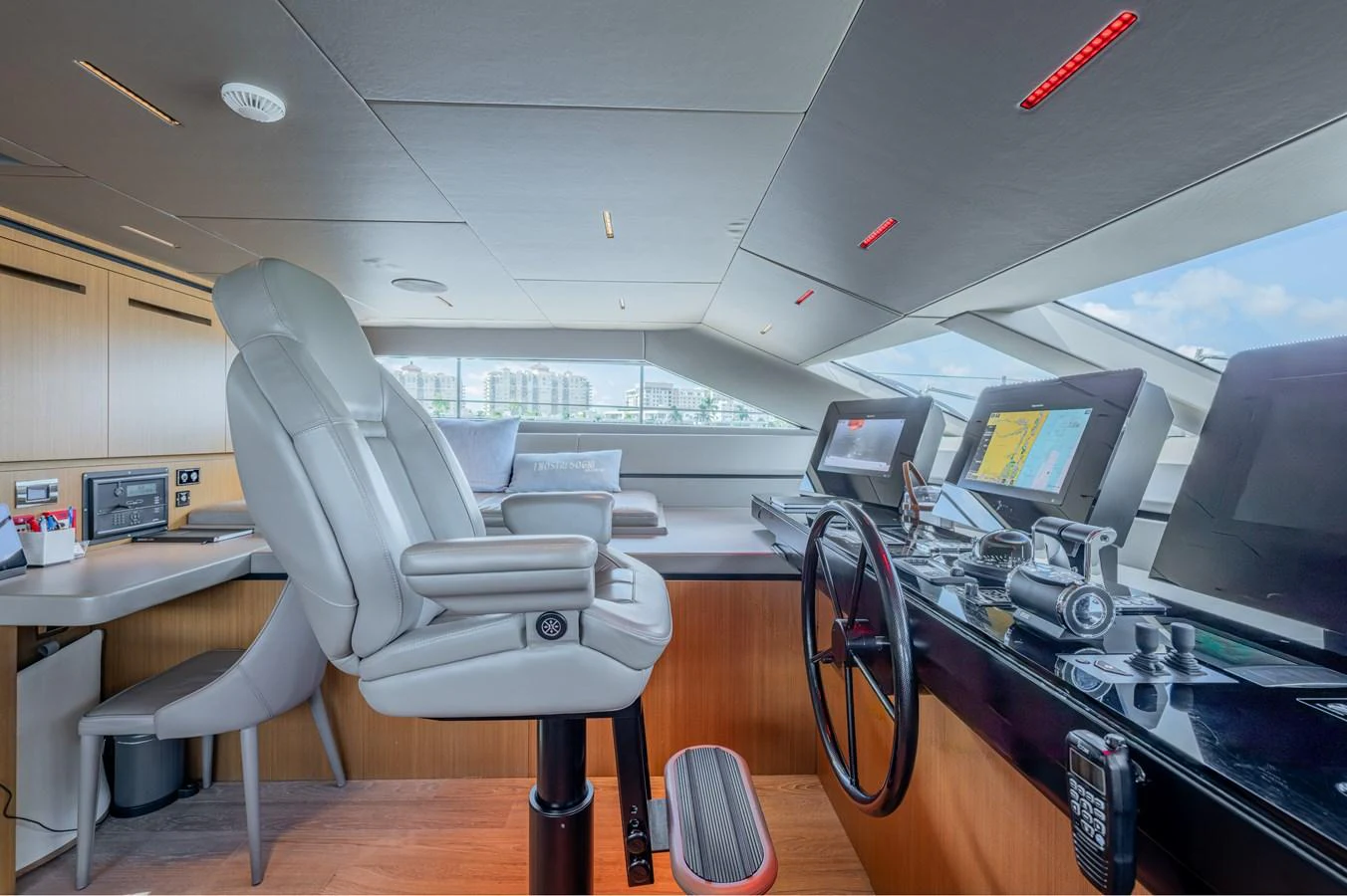 a room with a desk and computers aboard SANLORENZO SL120/778 Yacht for Sale
