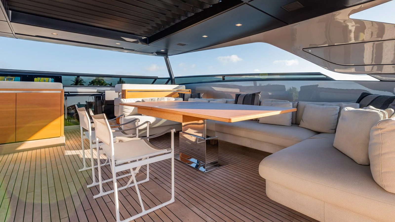 a room with a table and chairs aboard SANLORENZO SL120/778 Yacht for Sale