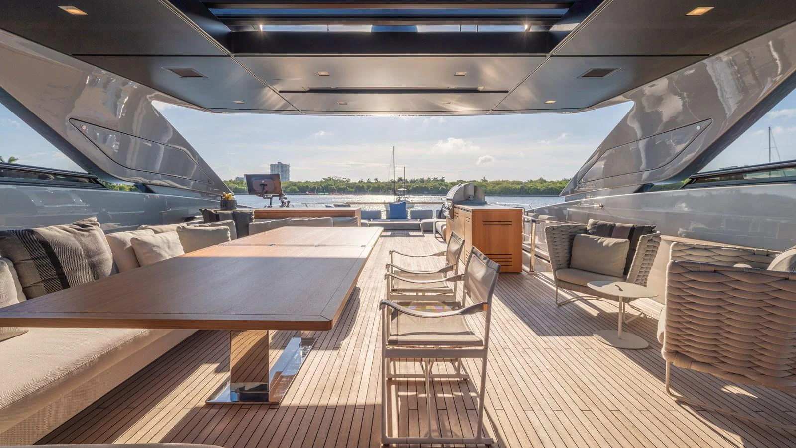 a room with a table and chairs aboard SANLORENZO SL120/778 Yacht for Sale