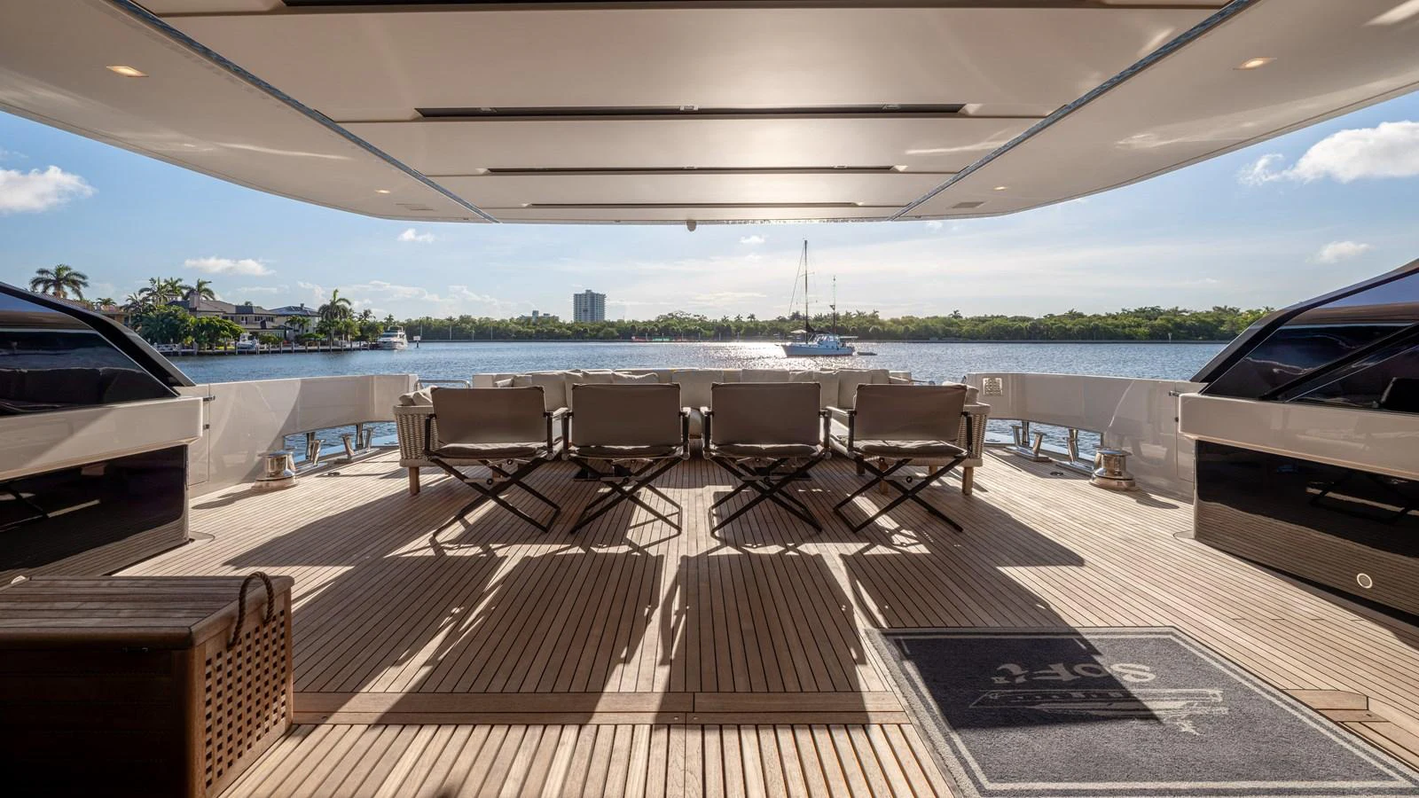 a deck with chairs and a body of water in the background aboard SANLORENZO SL120/778 Yacht for Sale