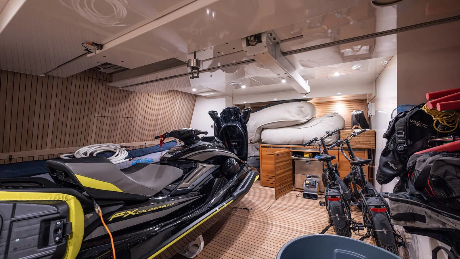 a room with a large group of equipment and a white bag on the floor aboard SANLORENZO SL120/778 Yacht for Sale
