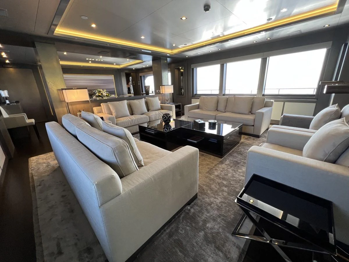 The spacious salon features plush seating and modern decor, creating a luxurious and comfortable atmosphere. aboard SMOOTH OPERATOR Yacht for Sale