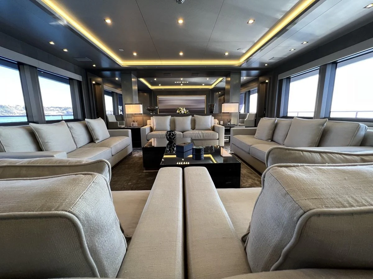 The spacious salon features luxurious seating and modern decor, offering a comfortable and elegant space for relaxation. aboard SMOOTH OPERATOR Yacht for Sale