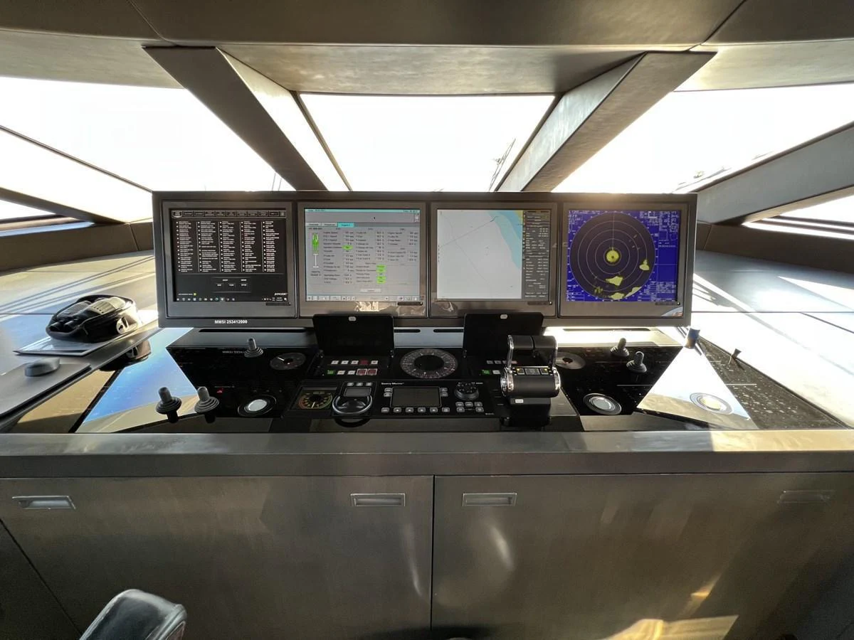 The helm station features advanced navigation and control systems for optimal yacht operation. aboard SMOOTH OPERATOR Yacht for Sale