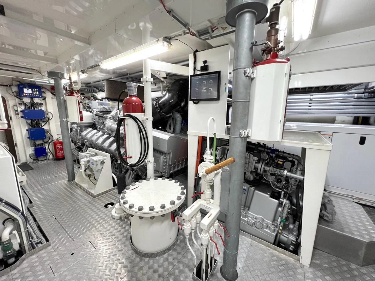 The engine room is equipped with advanced machinery and well-organized systems. aboard SMOOTH OPERATOR Yacht for Sale
