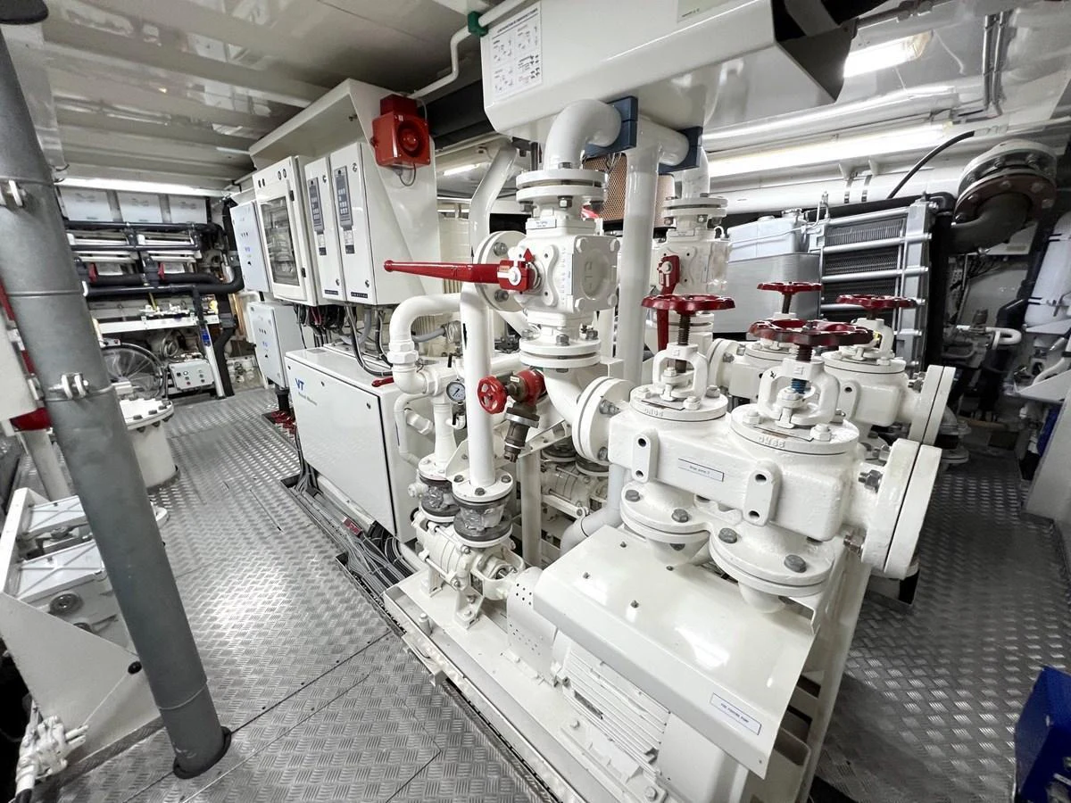 The image showcases the yacht's meticulously maintained engine room with advanced machinery and equipment. aboard SMOOTH OPERATOR Yacht for Sale