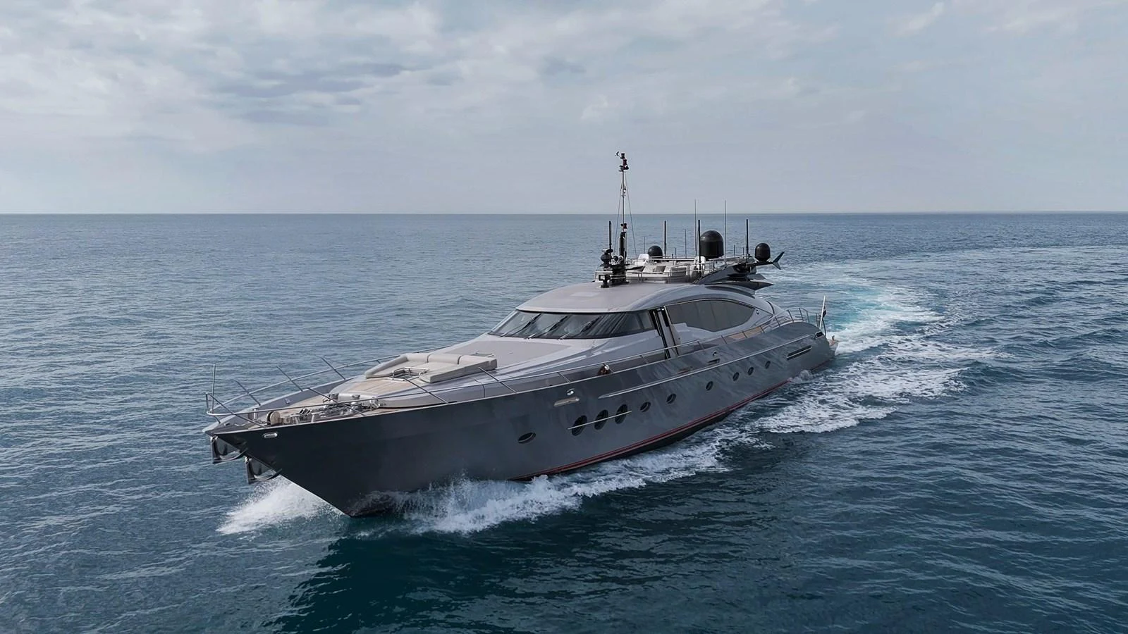 A sleek and modern yacht cruises through the open sea, showcasing its streamlined design and luxurious features. aboard BAGHEERA Yacht for Sale