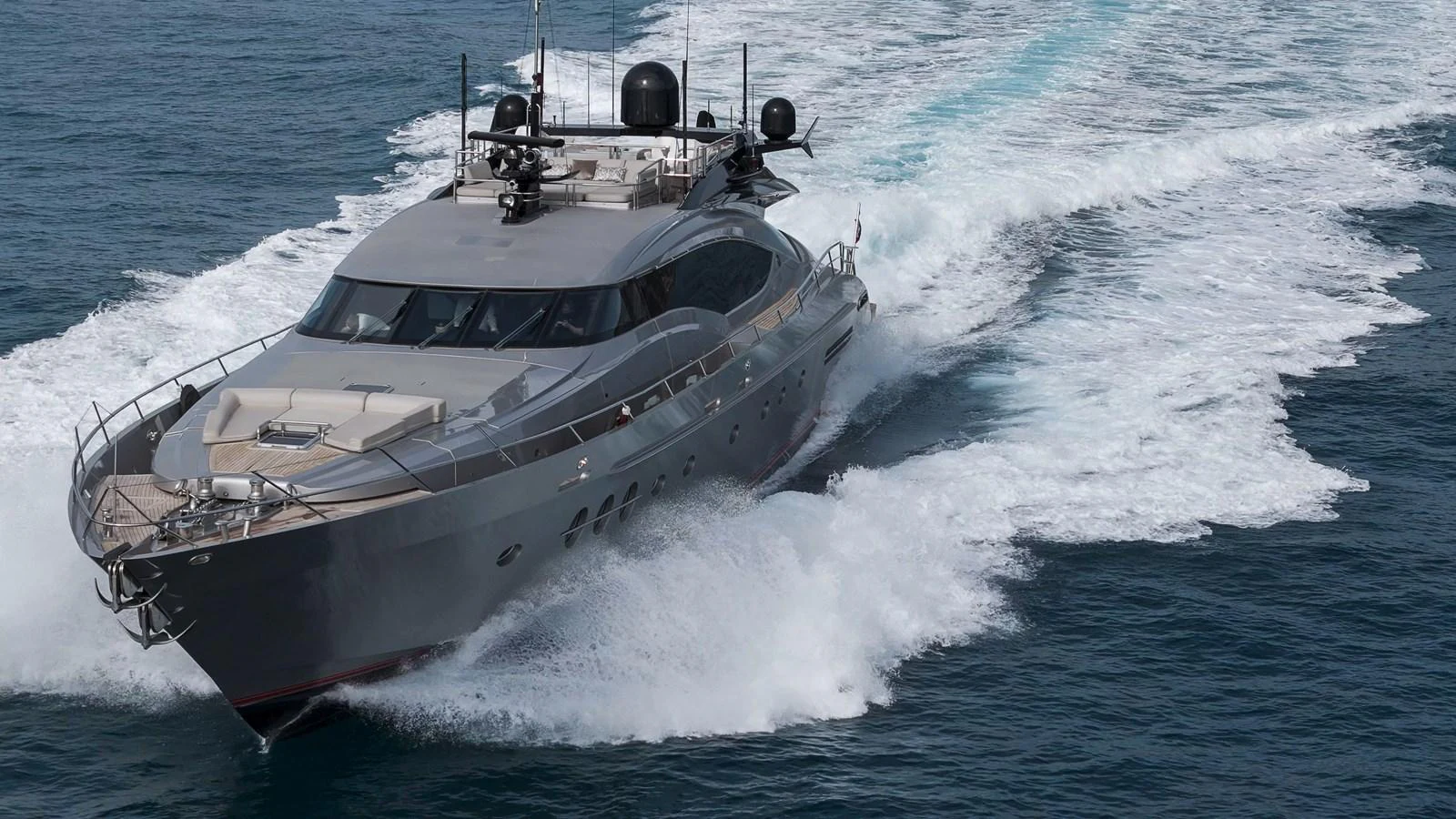 A sleek and modern yacht cuts through the water, showcasing its powerful design and luxurious features. aboard BAGHEERA Yacht for Sale